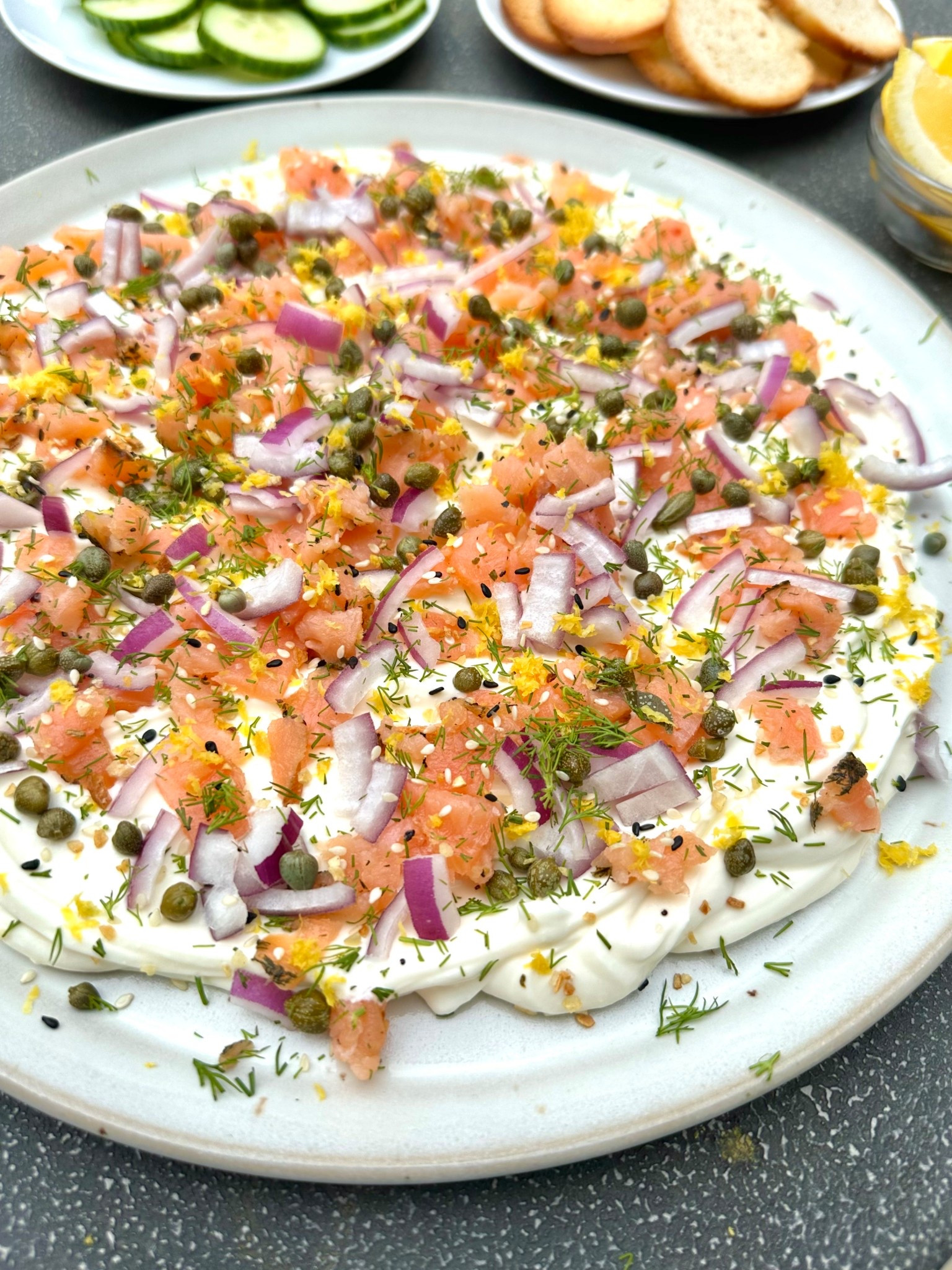 Smoked Salmon Bagel Dip makes an impressive addition to your brunch spread. Smoked salmon, red onion, capers, lemon zest, fresh herbs and everything bagel seasoning give this savory dish incredible flavor and texture.

#LTKHoliday #LTKfoodie