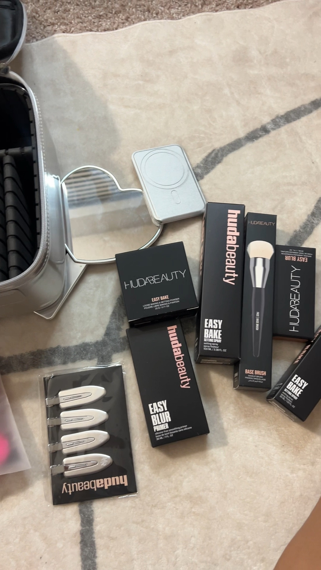 Just received an incredible package from @hudabeauty featuring some of their standout products that I absolutely LOVE:
	•	Easy Bake Setting Spray: This alcohol- and fragrance-free setting spray locks in makeup for up to 16 hours, ensuring a flawless finish that lasts all day. It’s formulated with skin-loving ingredients to smooth and blur the complexion.  ￼
	•	Mini Easy Bake Setting Spray: A travel-friendly version of the iconic setting spray, perfect for on-the-go touch-ups without compromising on performance.
	•	Easy Bake Loose Baking & Setting Powder: An easy-to-use loose powder, perfectly curated for all skin tones to create an airbrushed, long-lasting complexion while blurring the appearance of pores and fine lines.  ￼
	•	Easy Blur Foundation: This weightless, serum-like foundation offers a real-life filter effect with ultra-blurring and smoothing properties for an easy airbrushed finish. Infused with 1.5% niacinamide and pore-blurring silica, it provides medium to buildable coverage.  ￼
	•	#FauxFilter Luminous Matte Concealer: A crease-proof, medium to full coverage creamy concealer that brightens and conceals with a luminous matte, skin-like finish that lasts all day.  ￼
	•	Easy Blur Silicone-Free Smoothing & Pore-Minimizing Primer: This non-comedogenic, jelly-like primer instantly controls excess oil, smooths texture, and blurs pores for an airbrushed, soft-focus finish.  ￼

Each of these products has been a game-changer in my makeup routine, delivering exceptional quality and performance.

#HudaBeauty #EasyBake #EasyBlur #FauxFilter #MakeupFavorites #Gifted

#LTKFindsUnder50 #LTKBeauty #LTKSaleAlert