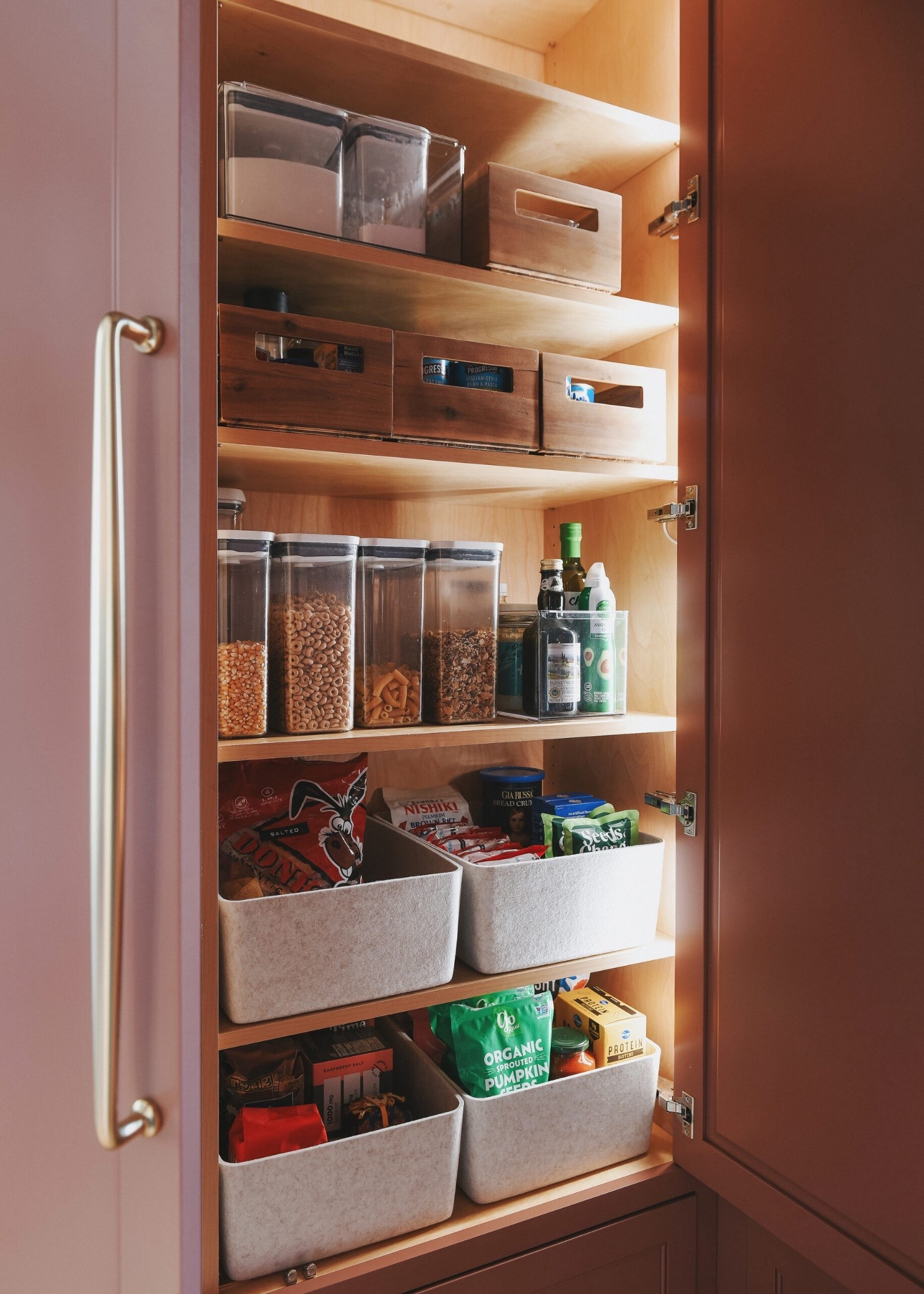 Our main food storage on the right. We love the airtight containers and our bins to sort by category 

#LTKHome