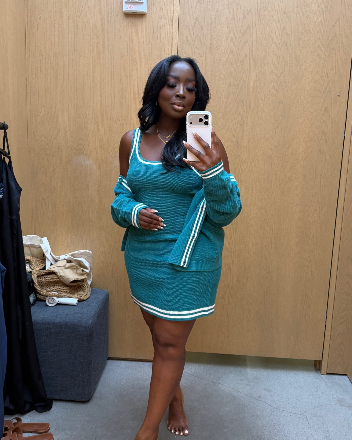 Wearing a large in the dress and a medium in this sweater from ALO.