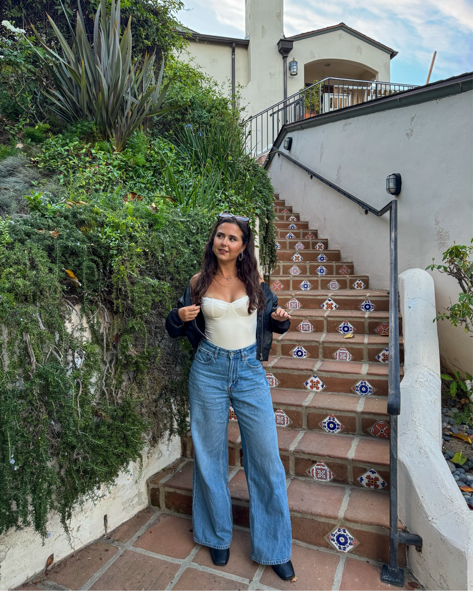 lace bodysuit paired with wide leg jeans, boots, and a leather jacket 🫶🏼

#LTKStyleTip #LTKPetite #LTKSeasonal