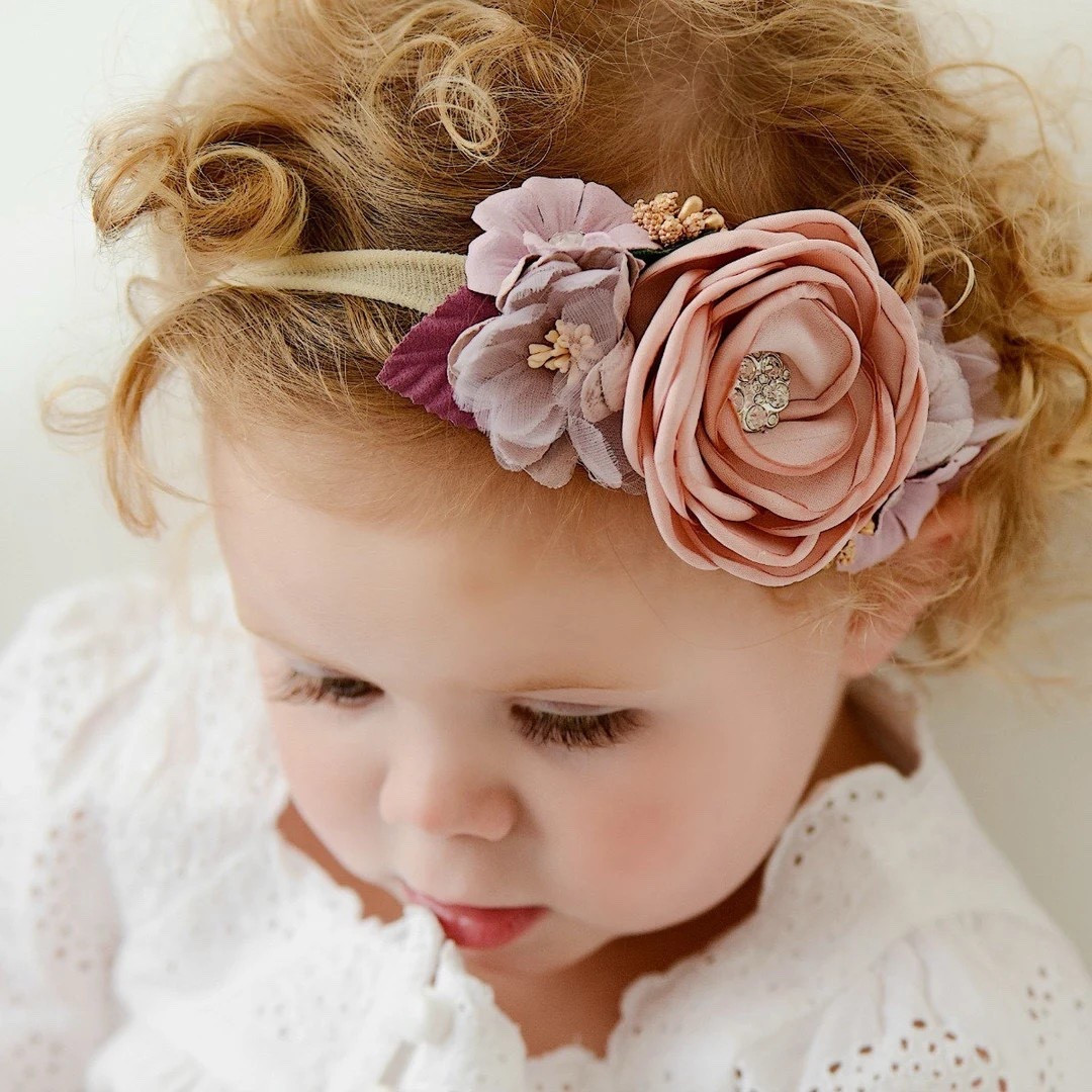 This adorable floral headband features a soft, stretchy nylon band topped with a sweet arrangement of blooms for the perfect everyday or special occasion accessory. Designed to grow with your little one, it comfortably fits from newborns to big girls—and can even be customized for adults. A versatile piece that adds a gentle, feminine touch to any outfit. 🌸✨ #LTKKids #HeadbandStyle #BabyAccessories #GirlsFashion #PhotoReady #BoutiqueStyle #LTKFinds #MomLife

#LTKWedding #LTKBaby #LTKSeasonal