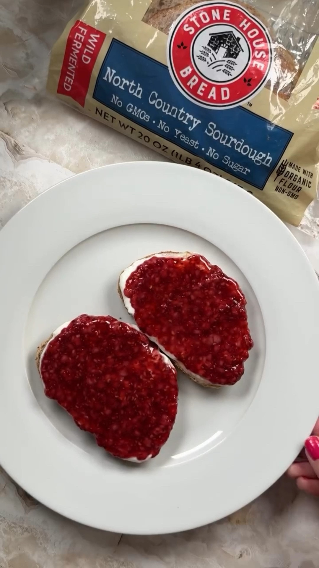 Friday breakfast made easy: raspberry chia toast 🍯🍞
 
Ingredients:
2 cups of raspberries
2 tablespoons chia seeds
1 tablespoon freshly squeezed lemon juice
2 tablespoons local honey
1/2 cup cottage cheese (blended) 
@stonehousebread sourdough
 
Directions:
On medium-high heat add raspberries, chia, lemon juice, and 1 tablespoon of honey into a sauce pot. Mash the fruit to your desired consistency. Remove from the heat and let cool for a few minutes.
 
Toast Stonehouse sourdough, add cottage cheese, top with the raspberry chia jam, and the last tablespoon of honey. 

Enjoy! 🩷
 
#stonehousebread #michiganbakery #traversecitymichigan

#LTKfoodie #LTKmorningroutine #LTKHome