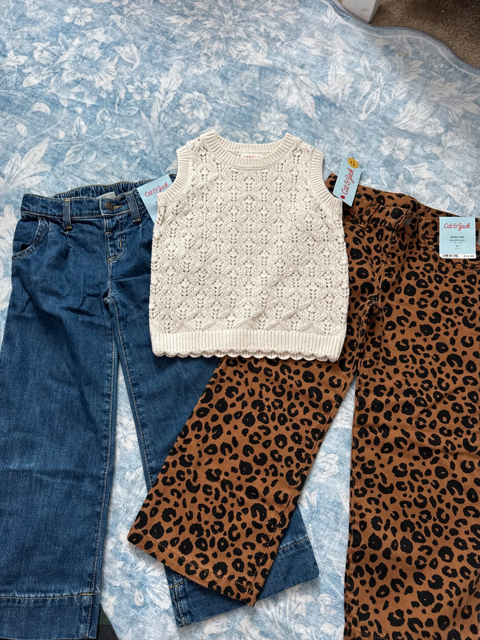 🍂 Toddler fall fashion finds from Target that are too cute to pass up! 😍 Cozy crochet knit vest + leopard flare pants + classic denim = the perfect mix of sweet + sass for your little one. 🐆✨ All pieces from Cat & Jack and under $15!

🛒 Shop this affordable fall look via the link in bio or tap the photo to shop! #TargetStyle #CatAndJack #ToddlerFallFashion #LTKkids #LTKfall #TargetFinds #MomLife #ToddlerOOTD #FallWardrobe 

#LTKStyleTip #LTKKids #LTKSeasonal