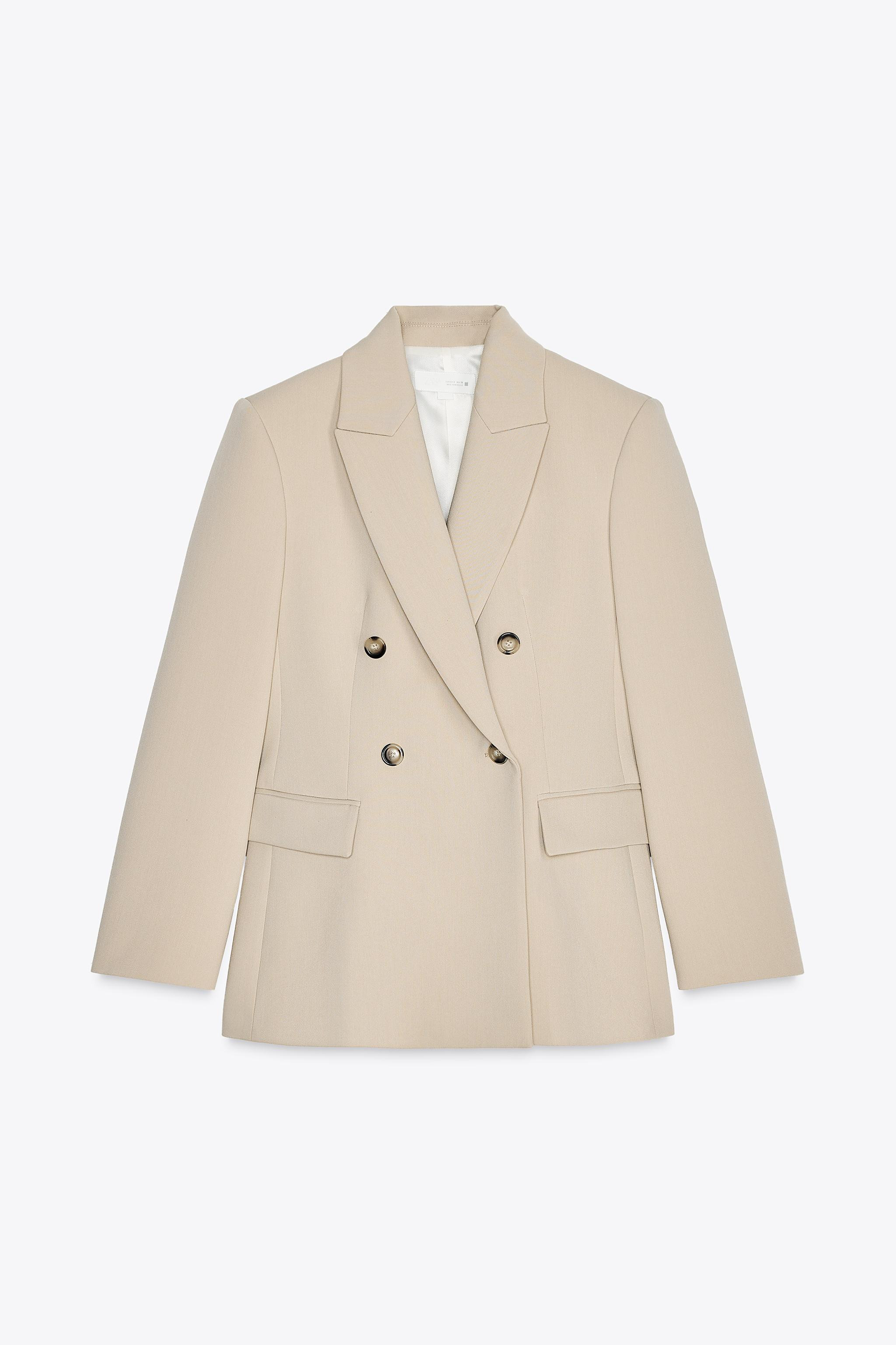 Long sleeve blazer with a lapel collar and shoulder pads. Front flap pockets. Back vents. Double-... | Zara US
