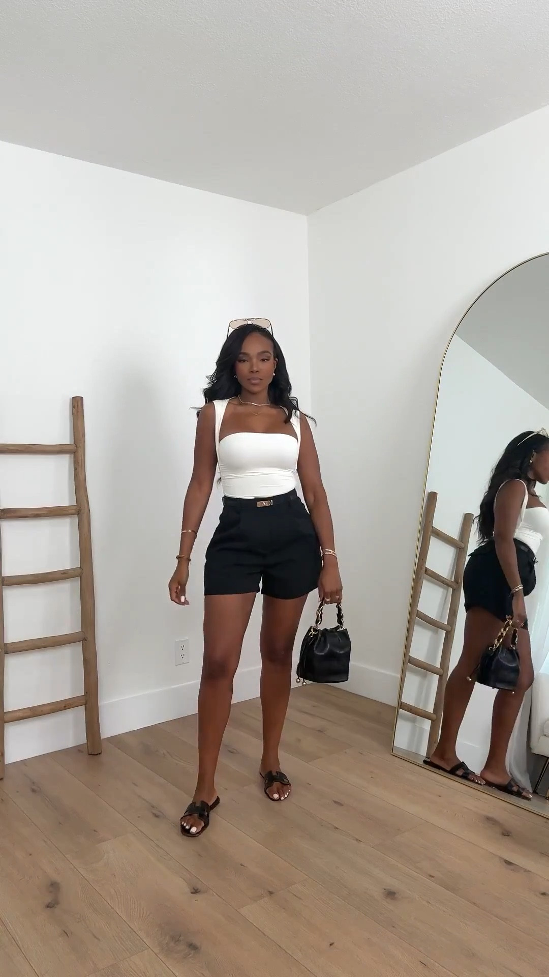 Scroll to shop this classic summer outfit featuring a fitted white tank styled with tailored black shorts and simple sandals for an effortless warm-weather look. Clean basics like these are easy to style multiple ways, making the cost per wear drop over time while building a versatile everyday wardrobe.

Perfect for casual days, vacations, running errands, brunch, or warm-weather outings.

5'4" | 138 lbs | 34D bust | 27" waist | 40" hips

#LTKvlog #LTKootd

#LTKgrwm #LTKootd #LTKMidsize