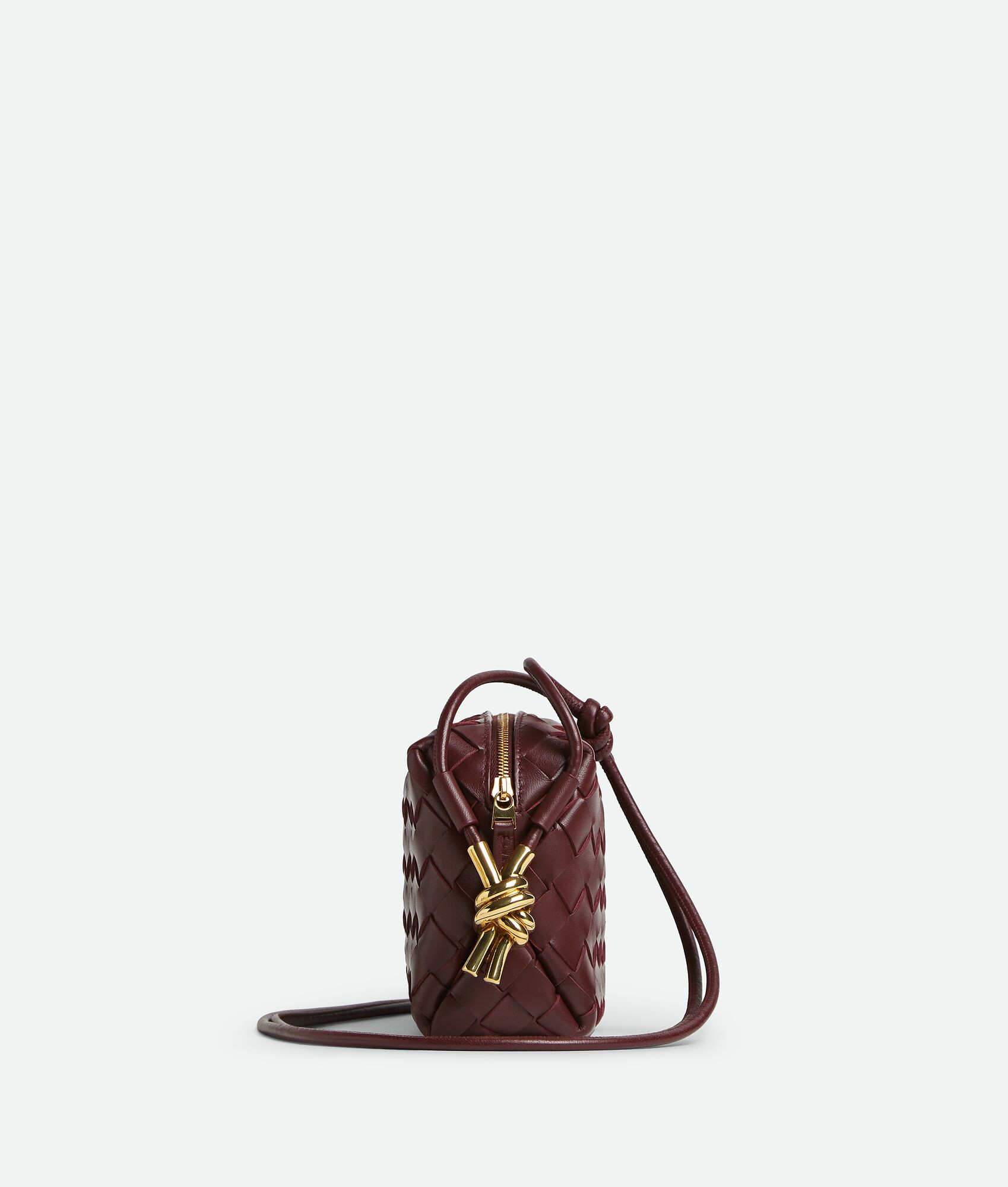 Bottega Veneta® Women's Mini Loop Metal Knots in Madder brown. Shop online now. | Bottega Veneta