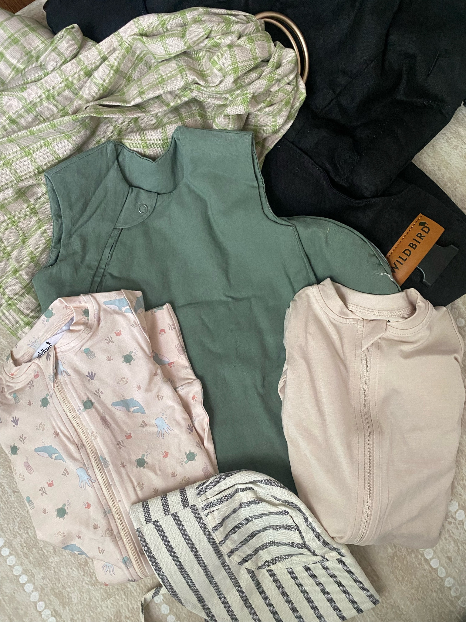 The sweetest new arrivals from wildbird! Sleepers, a sleep sack, an infant sling and infant carrier and a sun hat to top it off! 

#LTKFamily #LTKBump #LTKBaby