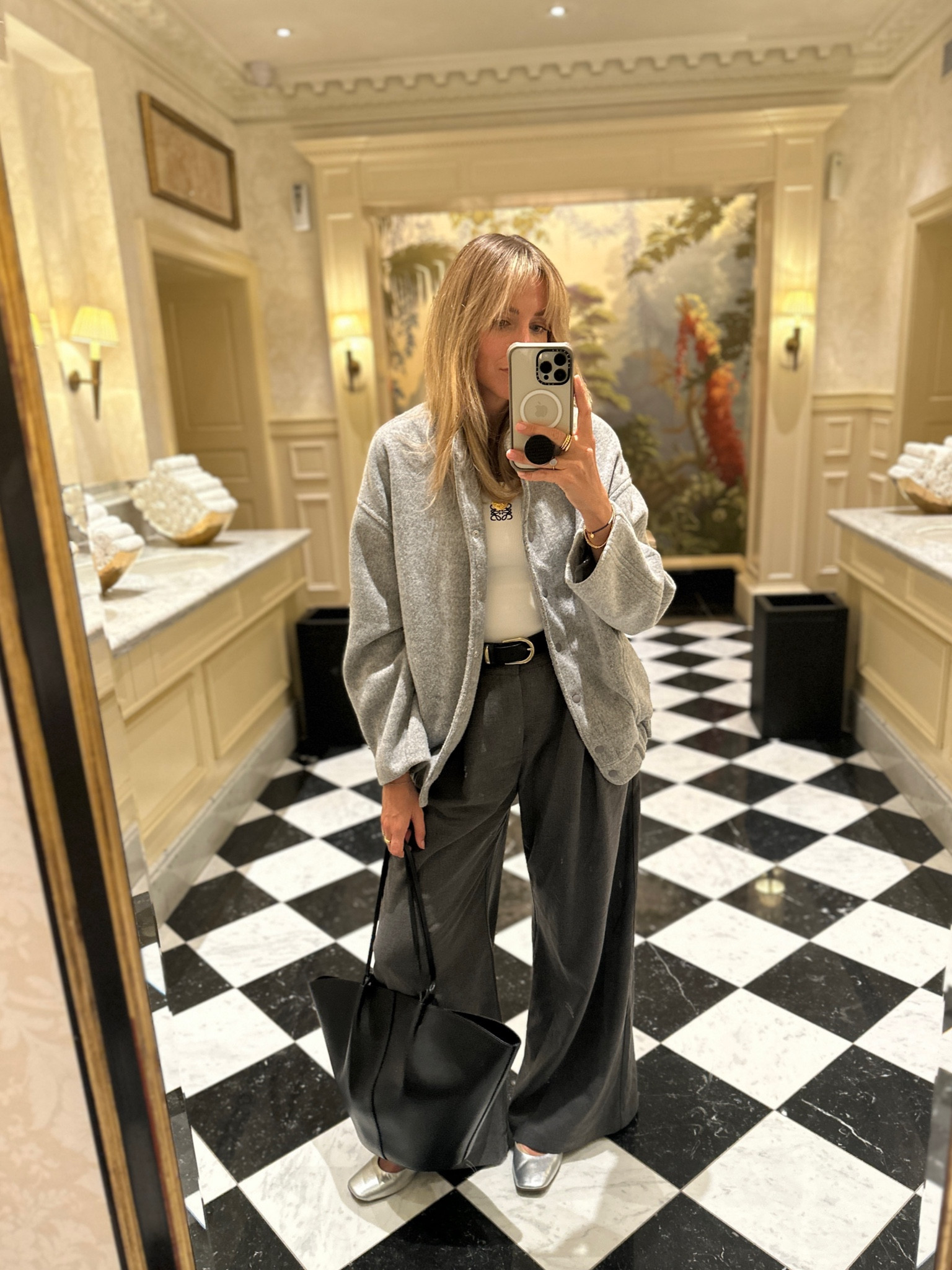 Wool grey bomber jacket
Grey trousers 
Loewe tank 
Black leather tote 

#LTKCon #LTKSeasonal #LTKeurope