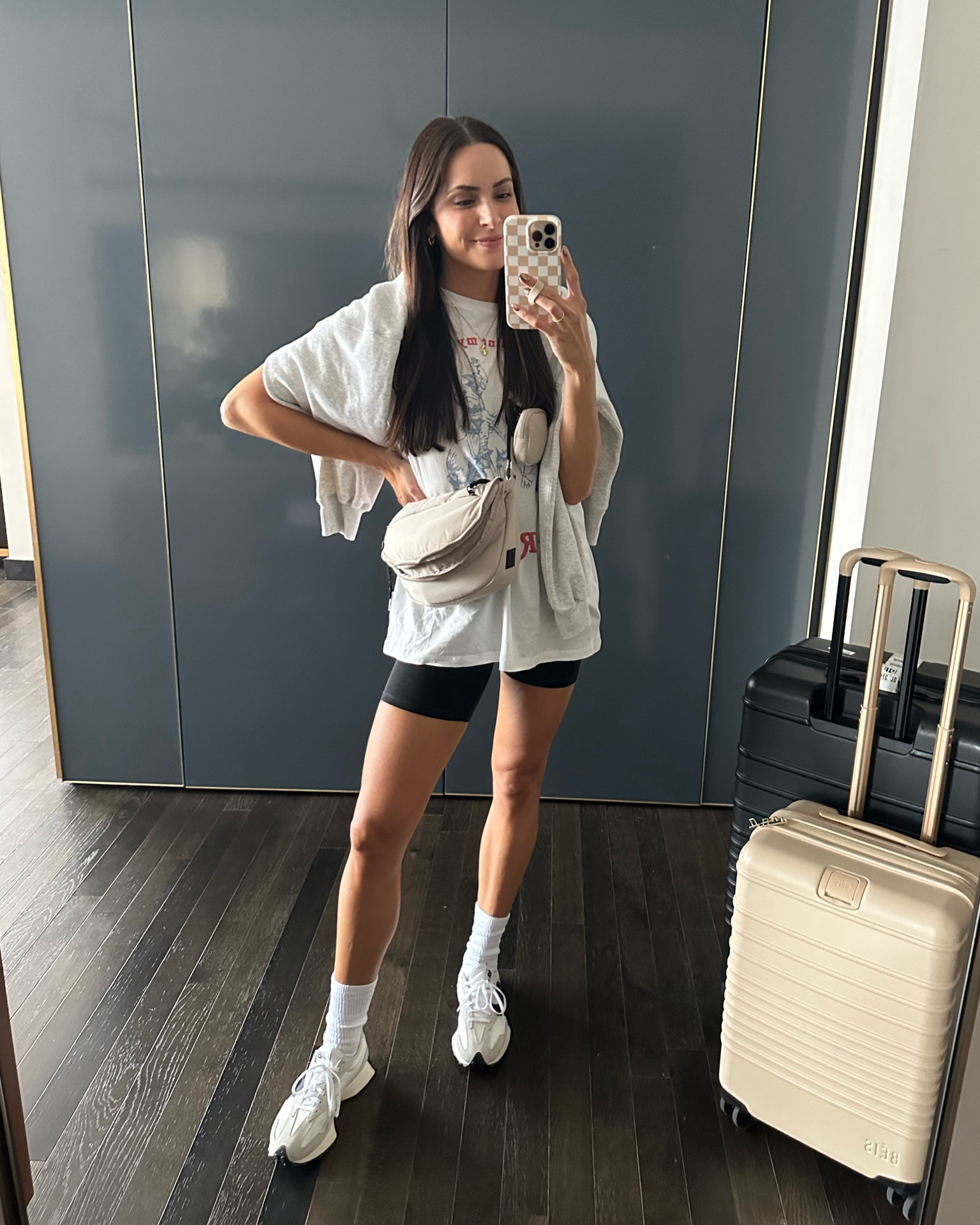 Today’s travel outfit ✈️ 
Graphic tee runs big so size down (XS)
Biker shorts: tts (S)
Sweatshirt: sized up (M) 
327 sneakers: tts 

#LTKfitness #LTKCon #LTKtravel