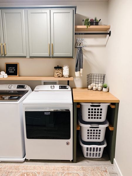 The progression of the laundry room renovation. These stock cabinets were perfect and affordable to add a pop of color and functional beautiful storage  

#LTKhome #LTKfamily