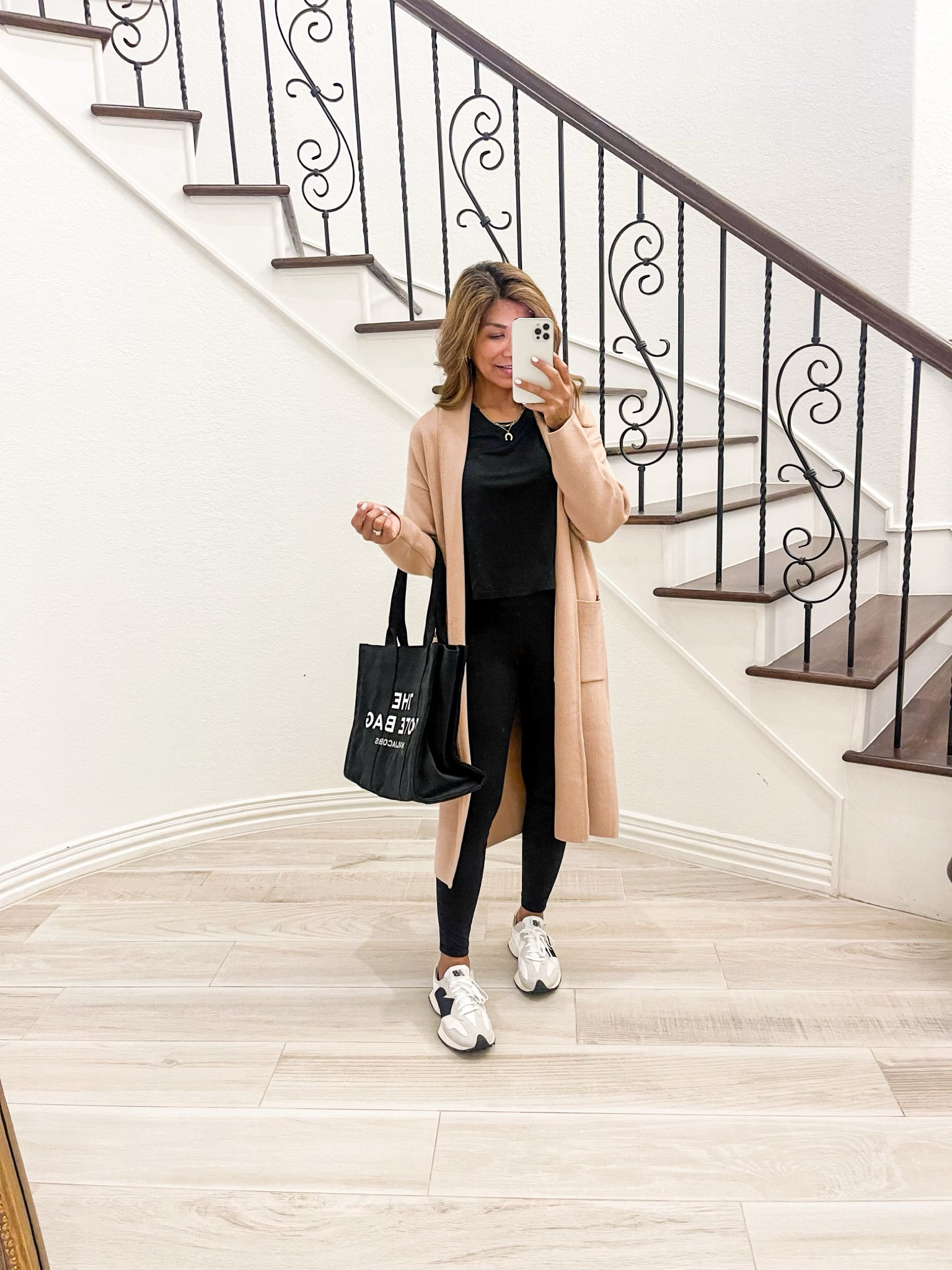 Bestselling sweater cardigan in small, fits tts. Color is Light Camel. Great quality and feels expensive. I love it. 
Black long sleeve top in small tts.
Black leggings in XS tts( I have the 7/8th length)
New Balance 327 fit tts.
The Tote Bag (large) also linked.

Fall fashion, airport outfit, travel outfit, Amazon finds, white sneakers, casual outfit, activewear, athleisure, comfy outfit, mom style.

Follow my shop @elvieinthecity on the @shop.LTK app to shop this post and get my exclusive app-only content!

#liketkit #LTKunder50 #LTKFind #LTKSeasonal
