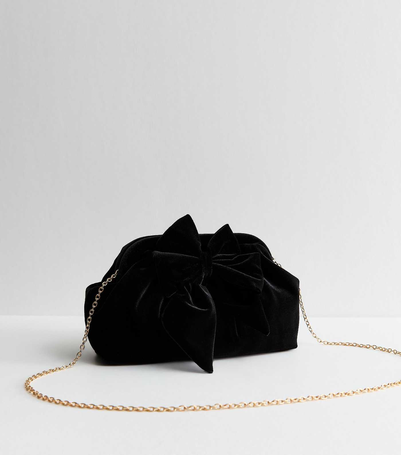 Black Bow Applique Velvet Slouch Clutch Bag | New Look | New Look (UK)