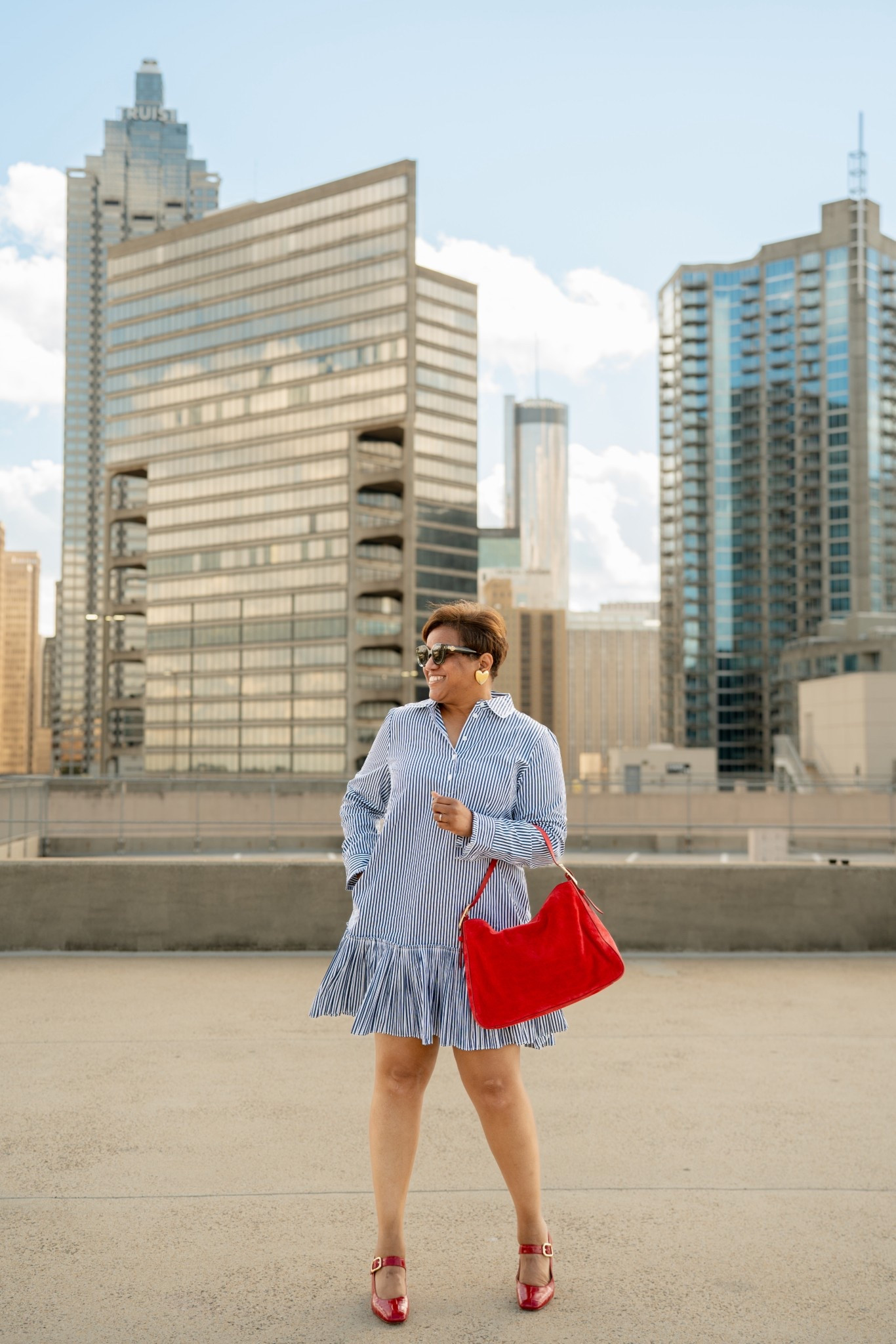The cutest striped dress!!!  And, pairing this beautiful dress with a bold pop of color is the way to go!  This dress fits TTS; the dress is offered in black, leopard and Foulard prints, and white, too! All versions are on sale with an additional 50% off! 👗👗👗
