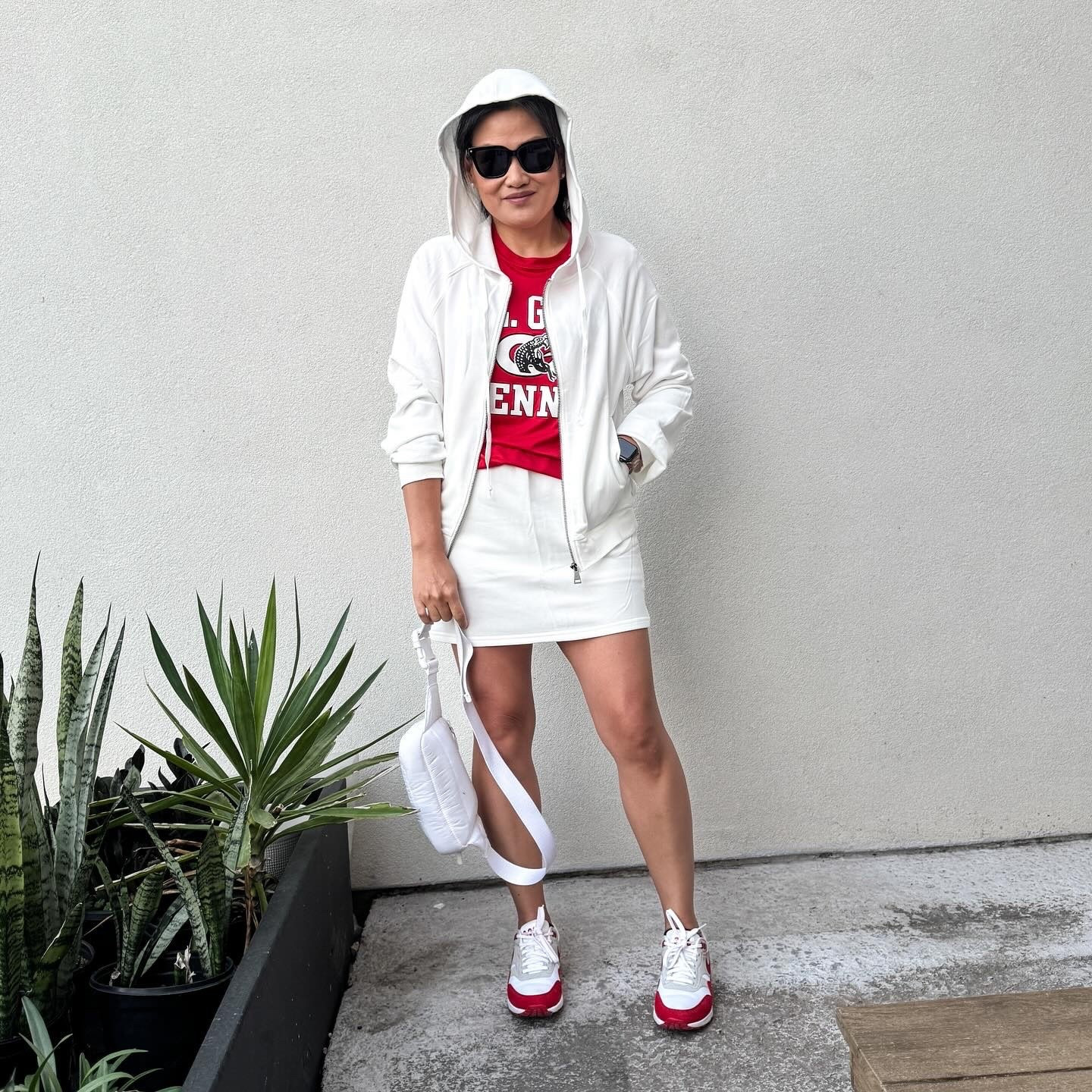 Finishing off “matching sets” week with this skort set. The set is the skort and matching zip-up. The shirt is my daughter’s fan shirt for tennis. 😆 It was perfect for the cool morning but hotter afternoon at the tournament. 

𝐎𝐔𝐓𝐅𝐈𝐓 𝐃𝐄𝐓𝐀𝐈𝐋𝐒:
Shoes: @nike ; Skort Set: @amazon ; Bag: @lululemon