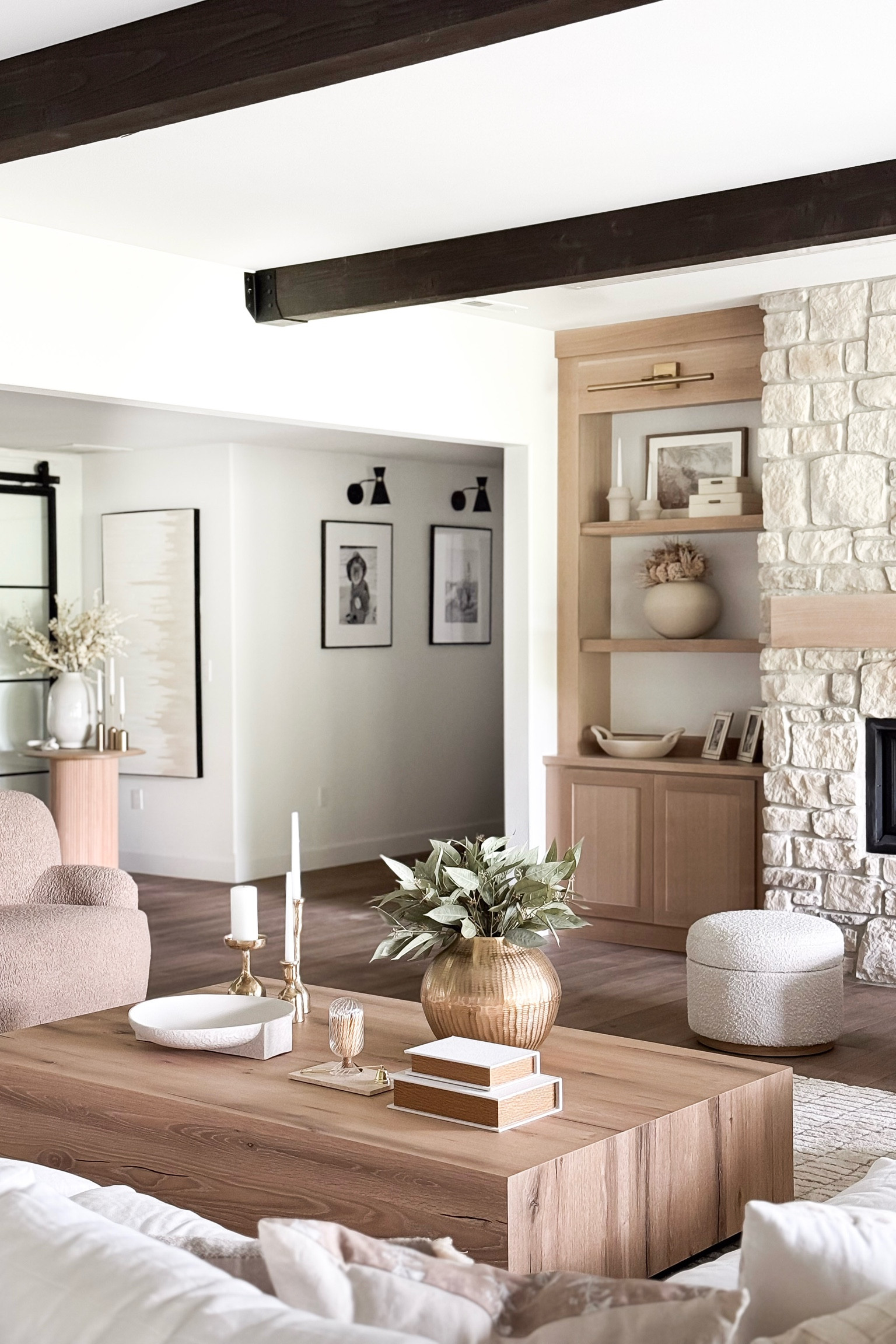 Here is a full view of our recent basement refresh! It feels like a completely brand space and I love it.

Home, home decor, home finds, modern home, neutral home, organic home, coffee table, ottomans, built ins, shelf decor, vase, faux greenery, accent table, accent chair, candles, modern lighting

#LTKHome #LTKSeasonal #LTKSummerEdit