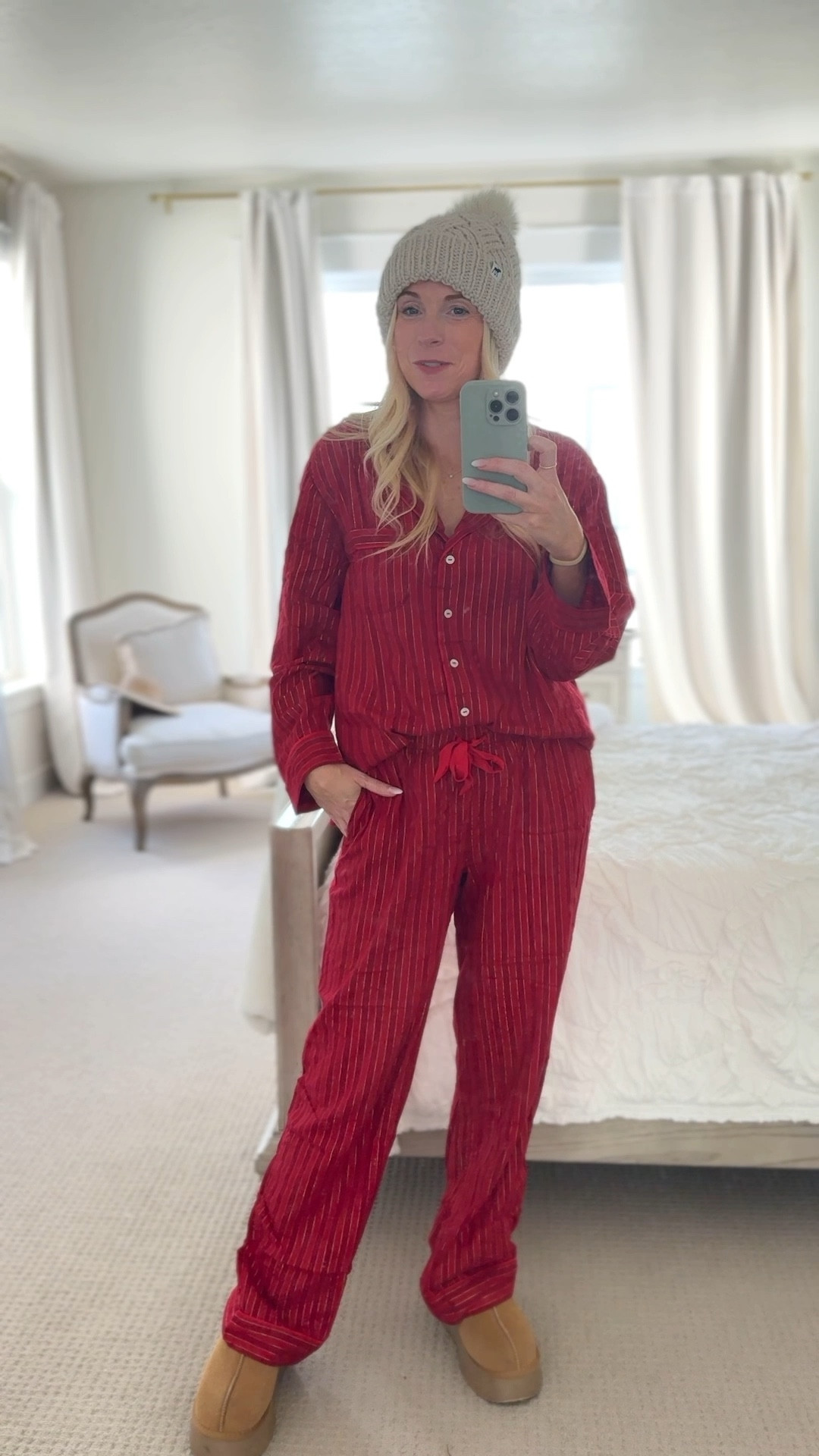 Christmas pajamas for mom — and these might be my favorite holiday pajamas I’ve ever worn.
They’re a soft flannel Christmas pajama set with the prettiest dainty gold stripe running through the fabric.

It’s subtle, sparkly, and feels classic for Christmas morning photos, holiday baking days, or cozy winter nights at home.

The front has a satin bow, but the waistband is fully elastic,
so you get the cute detail without having to tie and untie anything all December long.

They also have pockets (the best part), and the flannel is warm, breathable, and perfect for winter loungewear or holiday travel.

For sizing: I normally wear an XS and went up to a small, but I honestly didn’t need to — these women’s Christmas pajamas already fit relaxed and cozy.

If you’re looking for cute Christmas pajamas, cozy winter pajamas, or a classic set that photographs beautifully for family Christmas traditions, these are the ones I’d recommend every time.