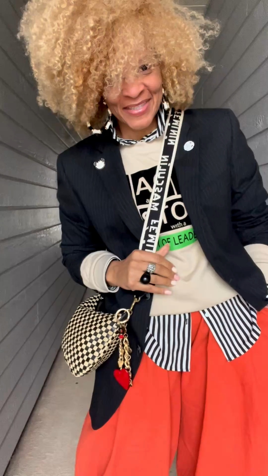 Thursday - Every day is an opportunity to celebrate Black history, and fashion is a fantastic way to express that.

✨Sweater Love: This oatmeal-colored sweater is everything! The bold BLACK HISTORY lettering makes a statement, and I love how it pops against my outfit.

👖Styling It Up: I paired it with vibrant orange pants and a classic striped shirt underneath for a fun twist.

👢Shoe Game: I switched it up with both boots and sneakers, showing how versatile this look can be!

#ootd #blackhistory #everyday #styleinspo #teachersofinstagram 

Blazer: @Macys
Sweater: @aprilmayeco  IG
Shirt: @Zara
Bottom: @amazon
Sneakers: @seavees
Boots: @Schutz 
Bag: @shopclarev
Rings: @hellobaabs (use code STORY20)

#LTKSaleAlert #LTKootd #LTKWorkwear