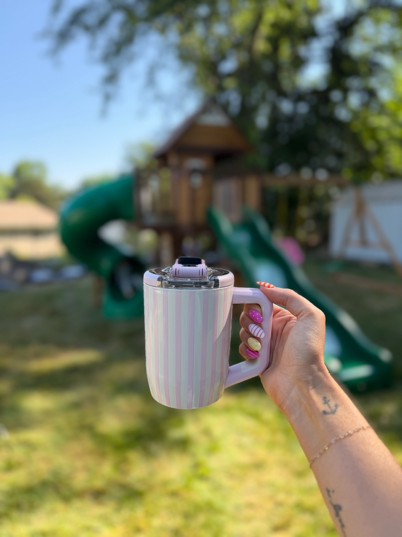 Morning from our backyard 🩷🩷 drinkin coffee while the kids go crazy on their new swingset!🥹best Sunday mornings!!! 

Summertime, Brumate mug, no-spill coffee cup, mom life

#LTKdayinmylife #LTKmomlife #LTKSeasonal