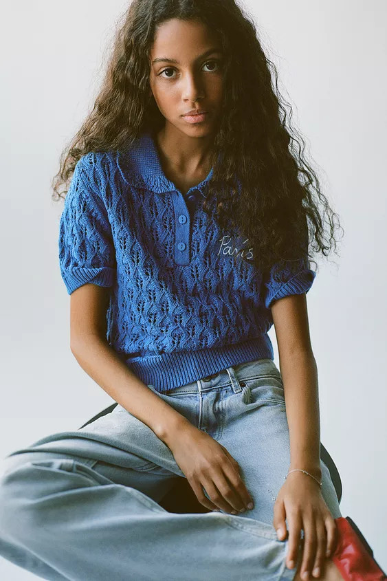 Polo shirt with polo collar and short sleeves. Button closure at yoke. Embroidered detail on ches... | Zara US