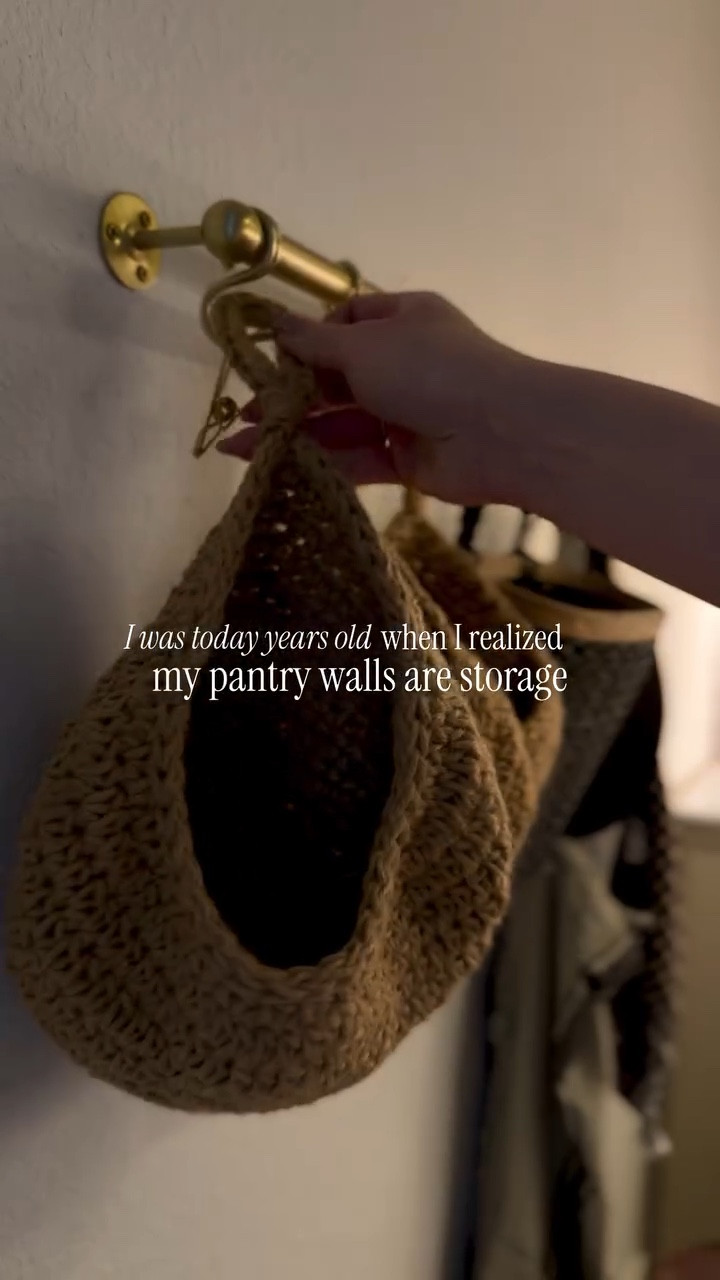 Meanwhile, I had an empty wall just sitting there the whole time. 🤭

Mounted a rod. Added hooks. Hung jute produce bags.
That’s it.

Now my shelves aren’t overcrowded, my produce can breathe, and everything is easier to grab. 🙌🏻

#pantryorganization #kitchenorganization #smallspacestorage #homeorganization #pantrygoals