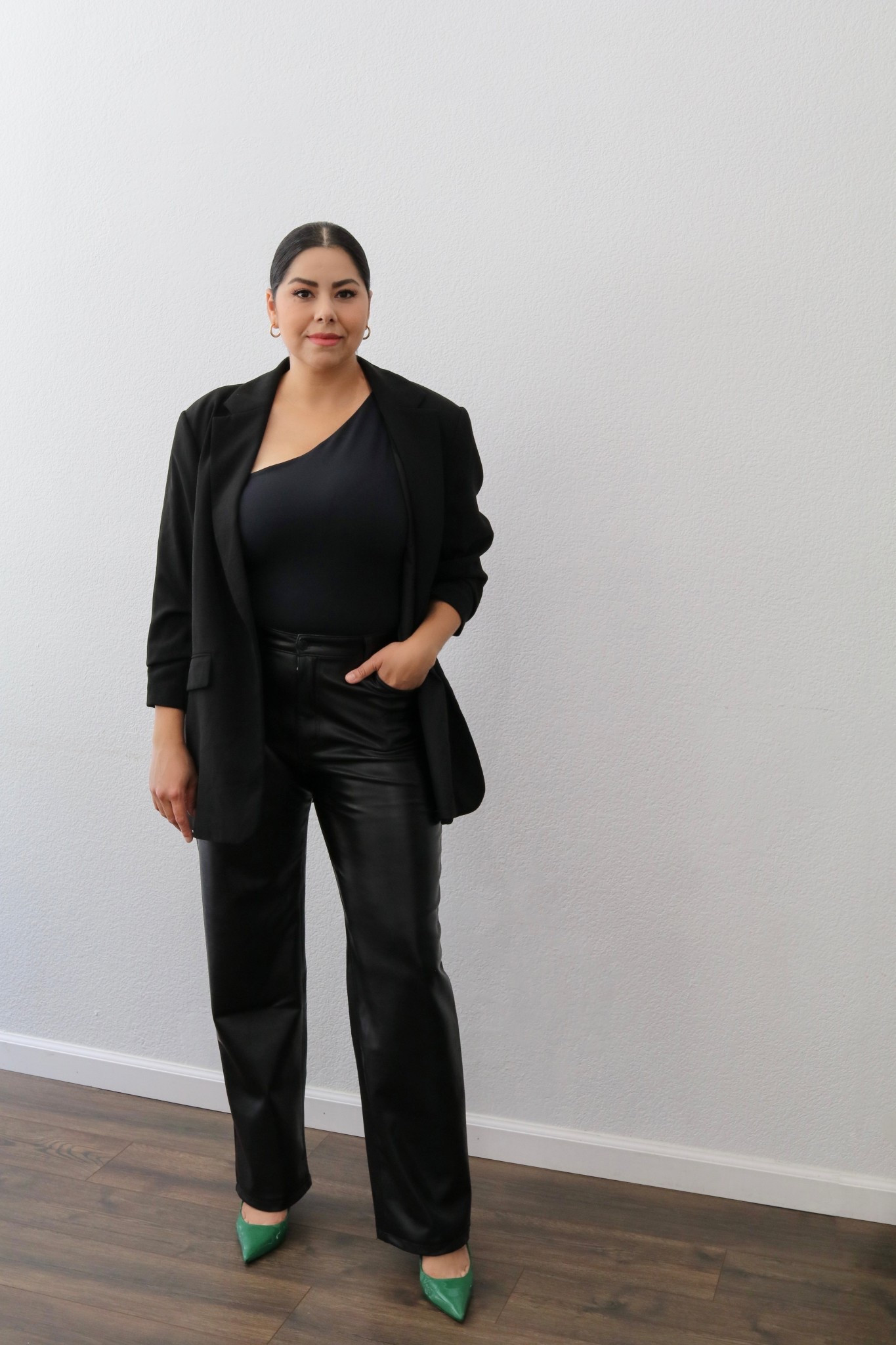 all black with a pop of green outfit with faux leather pants and black blazerr

#LTKShoeCrush #LTKOver40 #LTKStyleTip