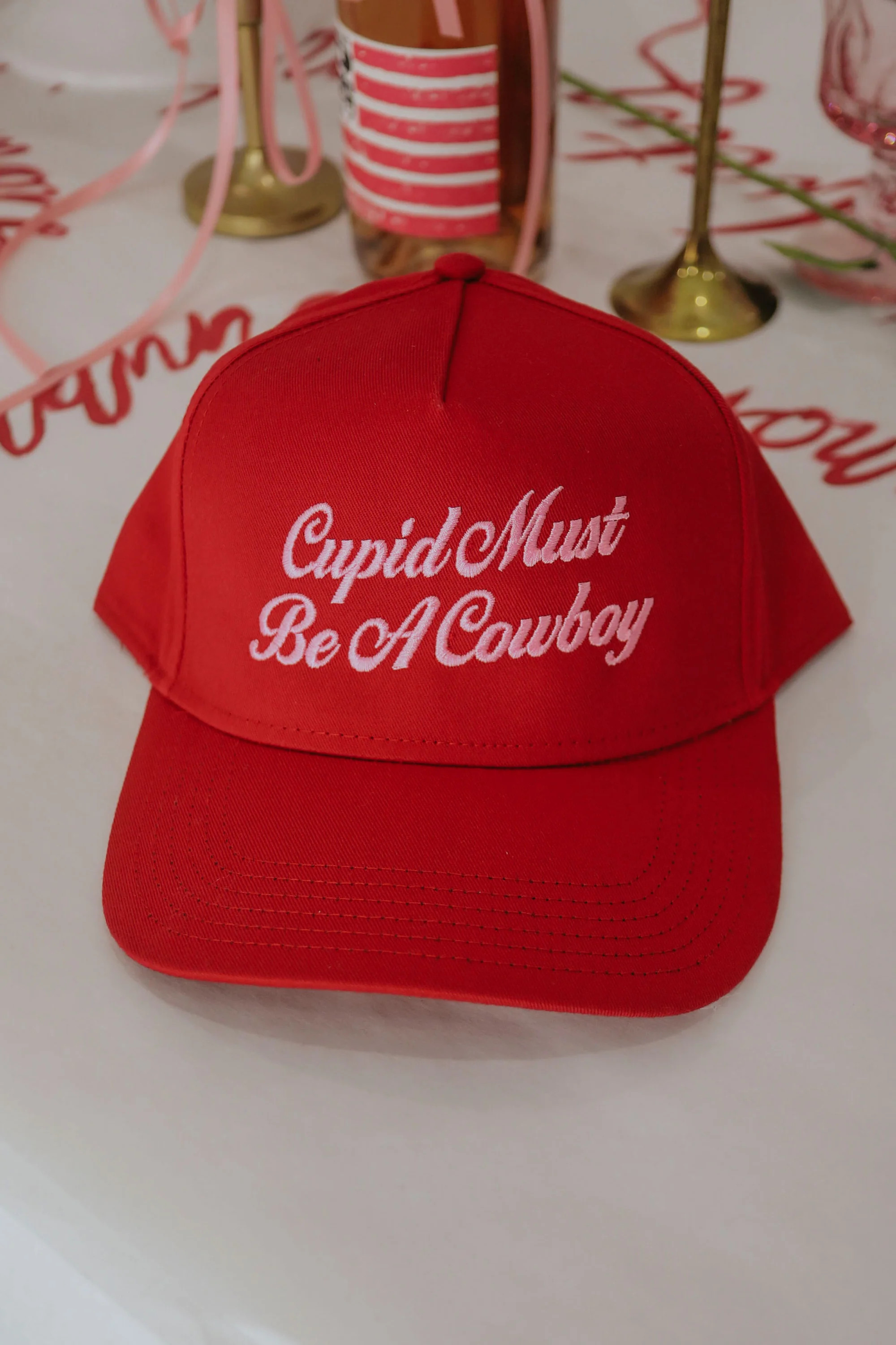 friday + saturday: cupid must be a cowboy trucker hat | RIFFRAFF