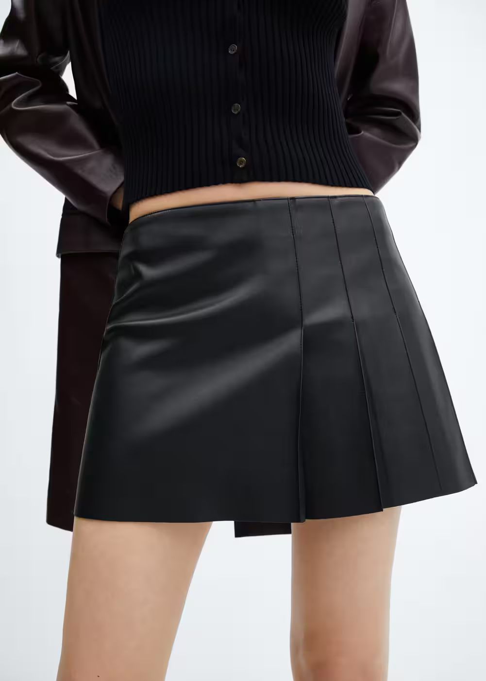Leather-effect pleated mini-skirt -  Women | Mango United Kingdom | MANGO (UK)