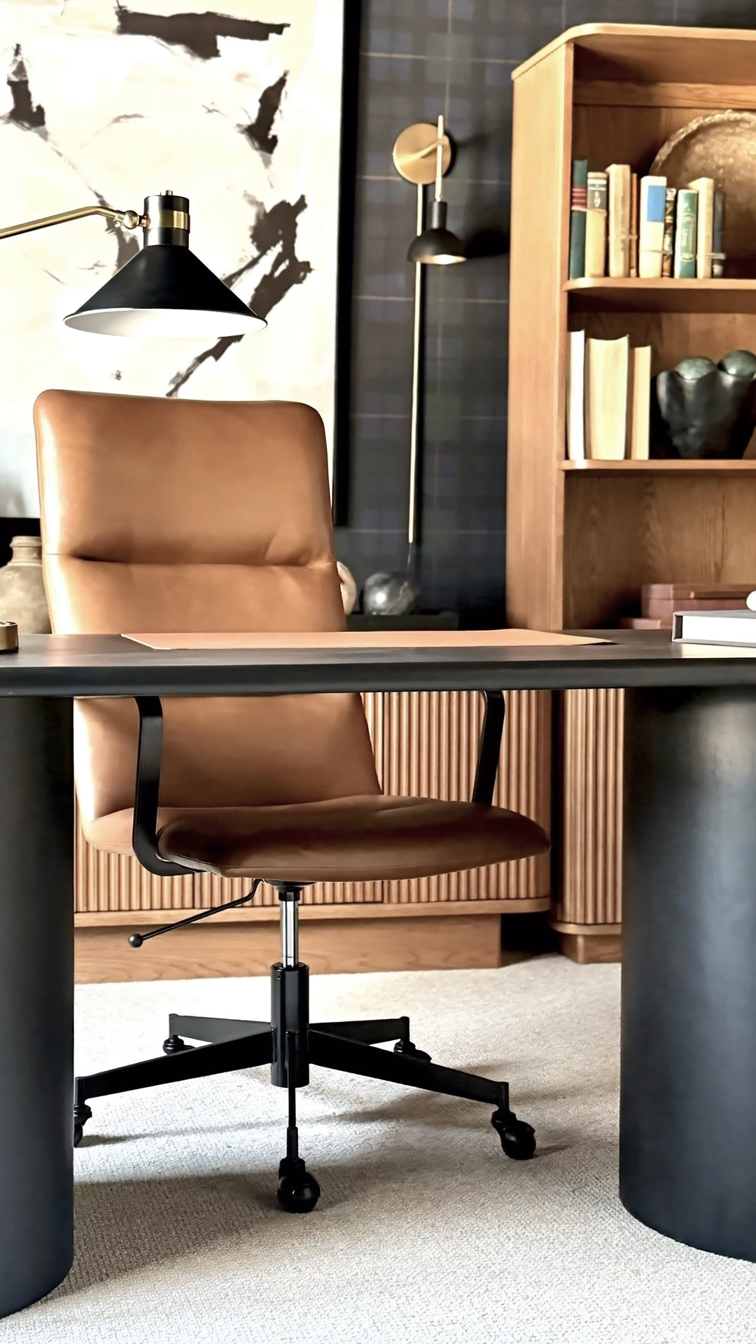 Before and after!
When a client requested a moody office..
I incorporated layered elements to achieve the look. Dark wallpaper sets the tone, complemented by bookcases, an oval desk, and a comfortable chair designed for long workdays from home 💕

@TWOPAGES 

#LTKdayinmylife #LTKHome #LTKSaleAlert