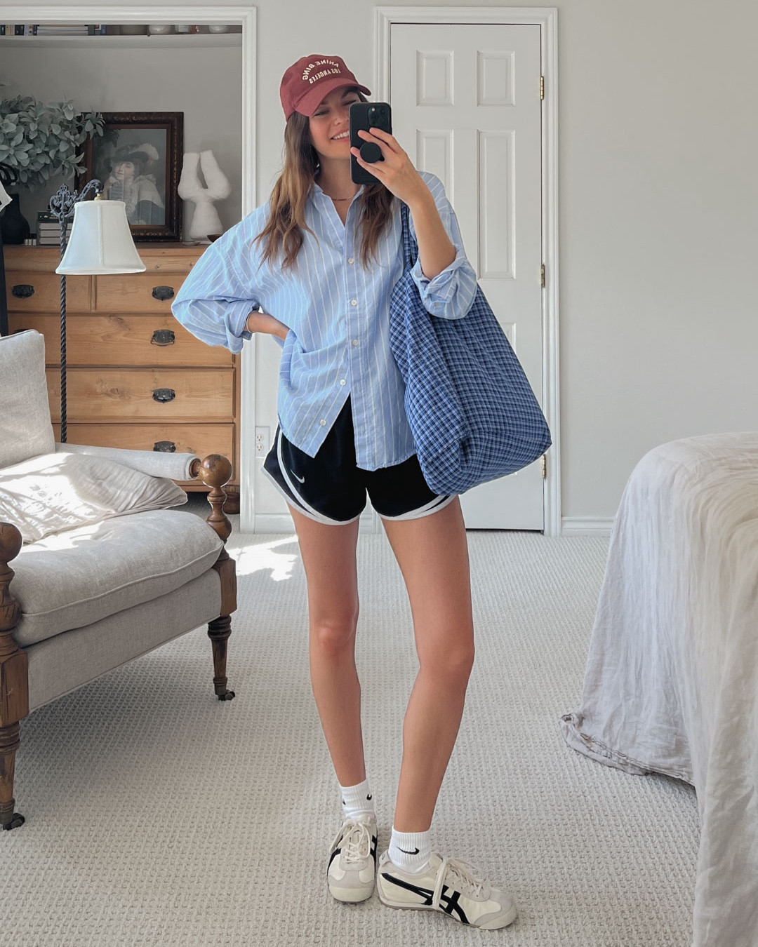 Capsule wardrobe day 4. My fav outfit formula: big button up shirt and running shorts. 

#LTKFindsUnder50 #LTKShoeCrush #LTKStyleTip