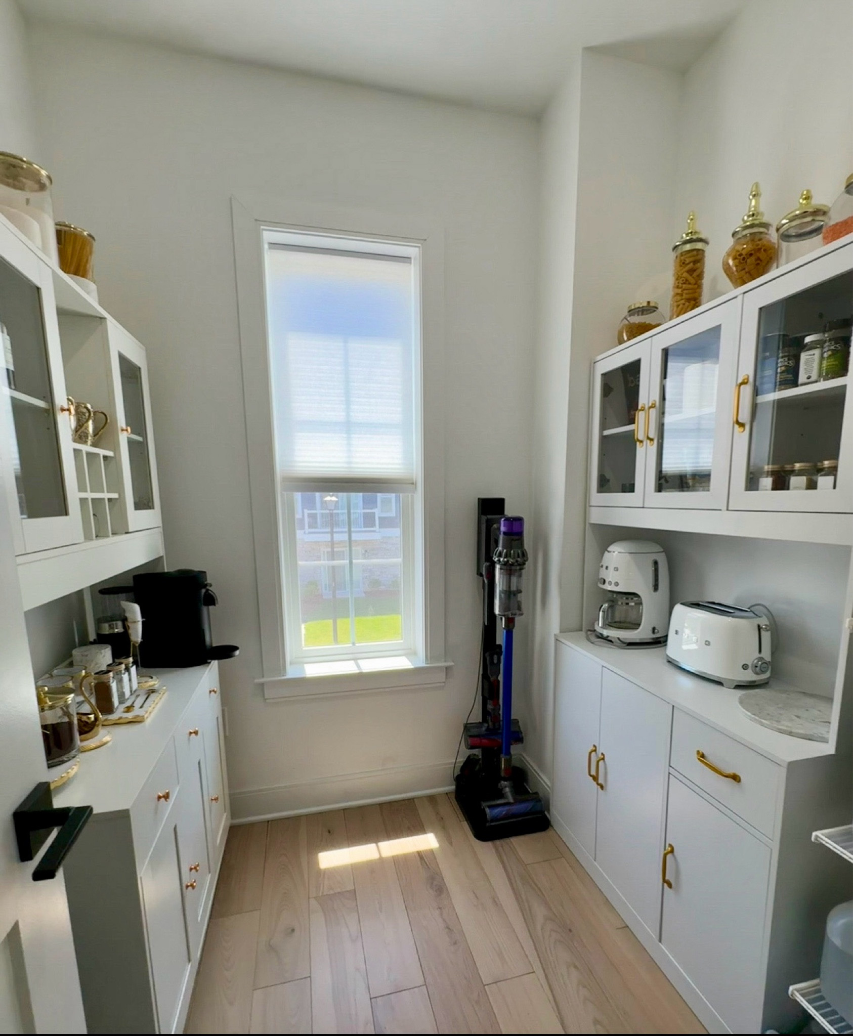 My walk-in pantry 🤩 

Instead of using this room as a typical storage space, or even as a cluttered pantry, I looked for dimensional ways to maximize this walk-in pantry, while still maintaining it as a “room” & as organized as possible...

Thanks to Wayfair, I found pantry units that did the trick! Linking them for your benefited use 🔗 Even if you don’t have a separate space for either or both pantry units, they are individually compact enough to fit in your kitchen as well! 

You’ll also see in the right, back corner, my Dyson vacuum + its stand. I’ve linked those, too! 😎

#LTKStyleTip #LTKSaleAlert #LTKHome