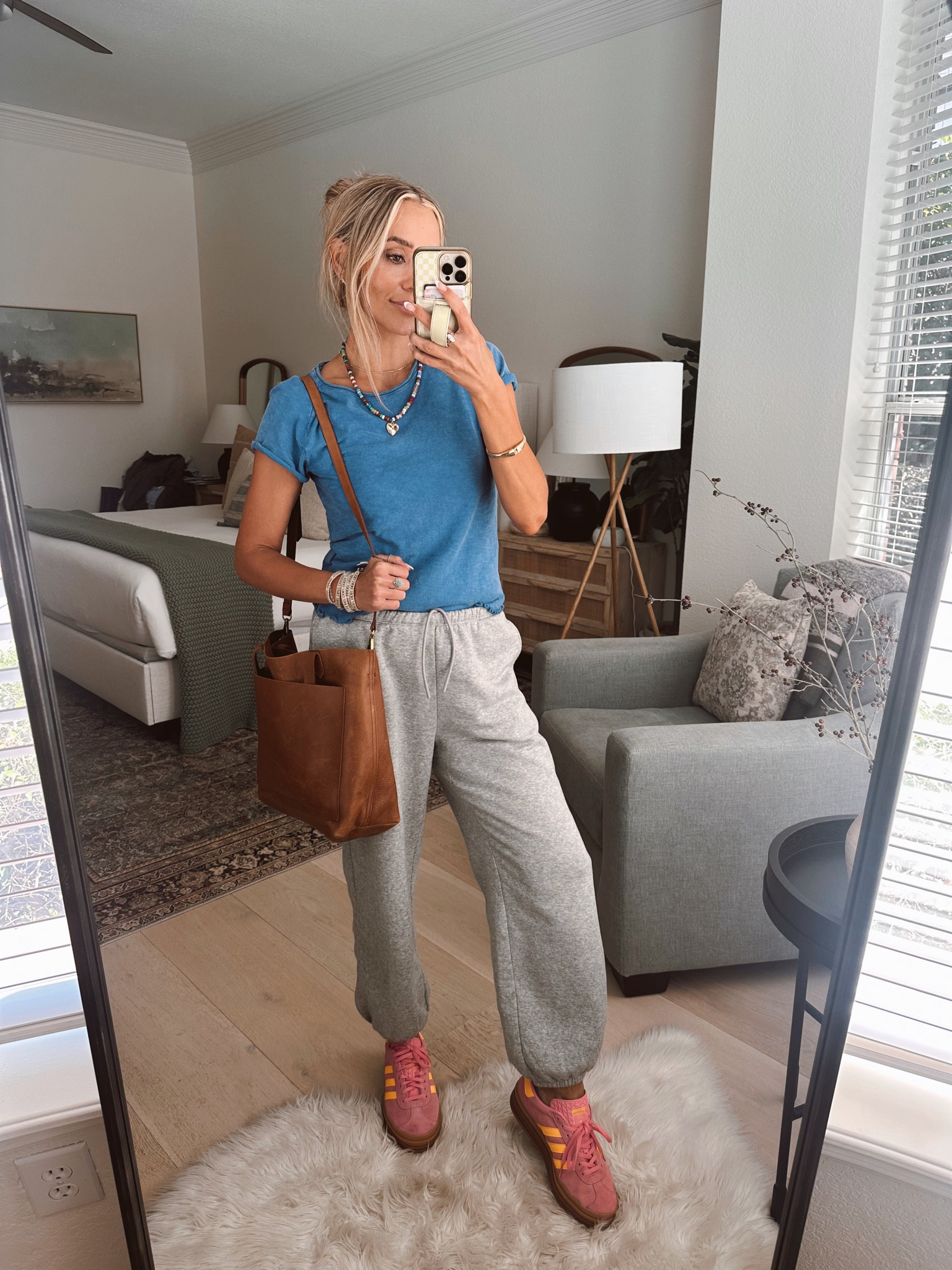 Elevated Comfy sweats look ✨🤍🎀

Free People Baby Tee: Large (up 2 sizes)
Fave Target Grey Sweats (small // tts)
Gazelle Adidas
Madewell tote 
Urban outfitters colorful beaded $15 necklace! 🤍