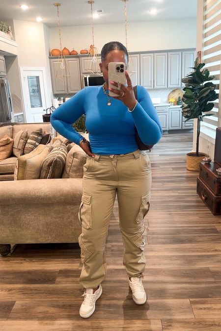 Top-  medium 
Cargo pants-  sized up to a 31
Sneakers-  tts 

Cargo pants -  cargo outfit - affordable fashion - women’s fashion - errands outfit - winter outfit - spring outfit - spring fashion - pop of color - sneakers - 

Follow my shop @styledbylynnai on the @shop.LTK app to shop this post and get my exclusive app-only content!

#liketkit 
@shop.ltk
https://liketk.it/4wI99

#LTKstyletip #LTKSpringSale #LTKshoecrush