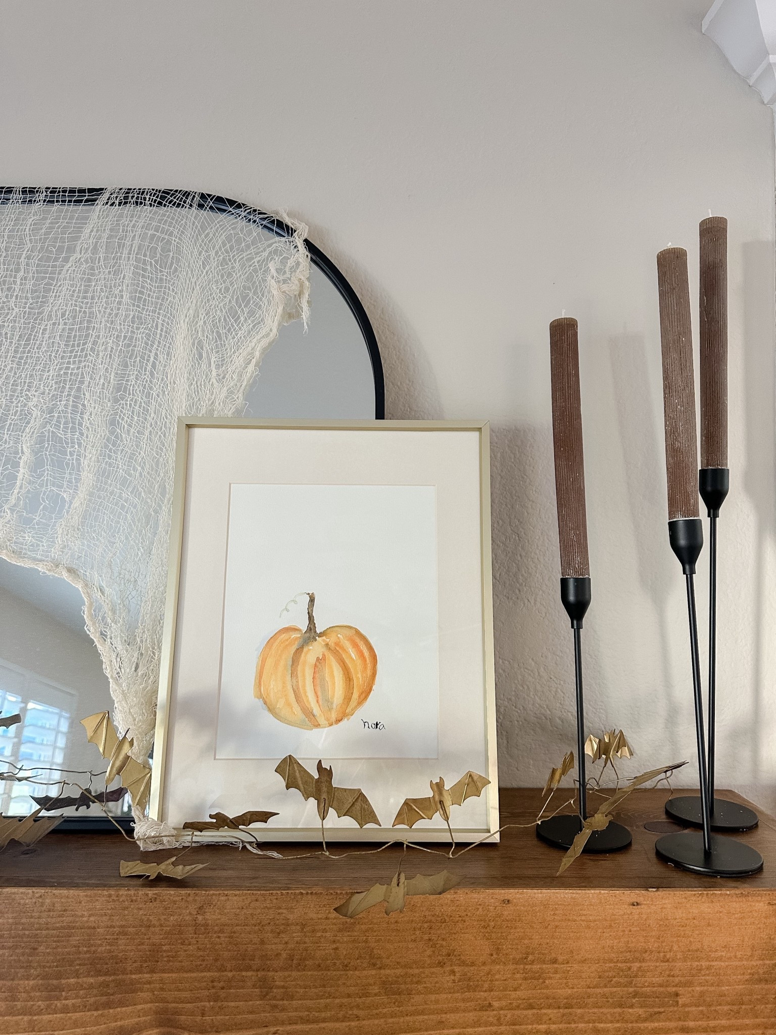 Falloween mantel

Mirror on the mantel
Brown pleated taper candles
Taper candle holders
Halloween creepy cloth

#LTKHalloween #LTKSeasonal #LTKHome