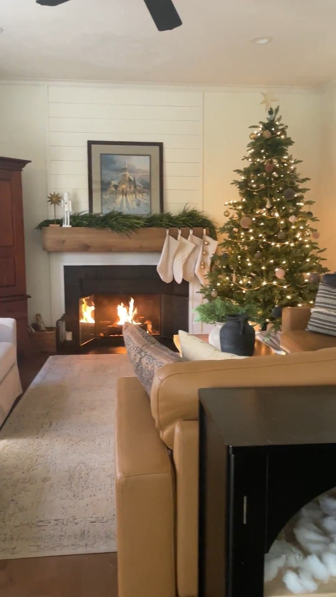 Our family room is all ready for cozy Christmas celebrations.  

King of Christmas tree.  Camel leather sectional.  Wooden coffee table.  Christmas garland.  Christmas ornament.  Swivel accent chairs.  

#LTKHome #LTKHoliday #LTKSaleAlert