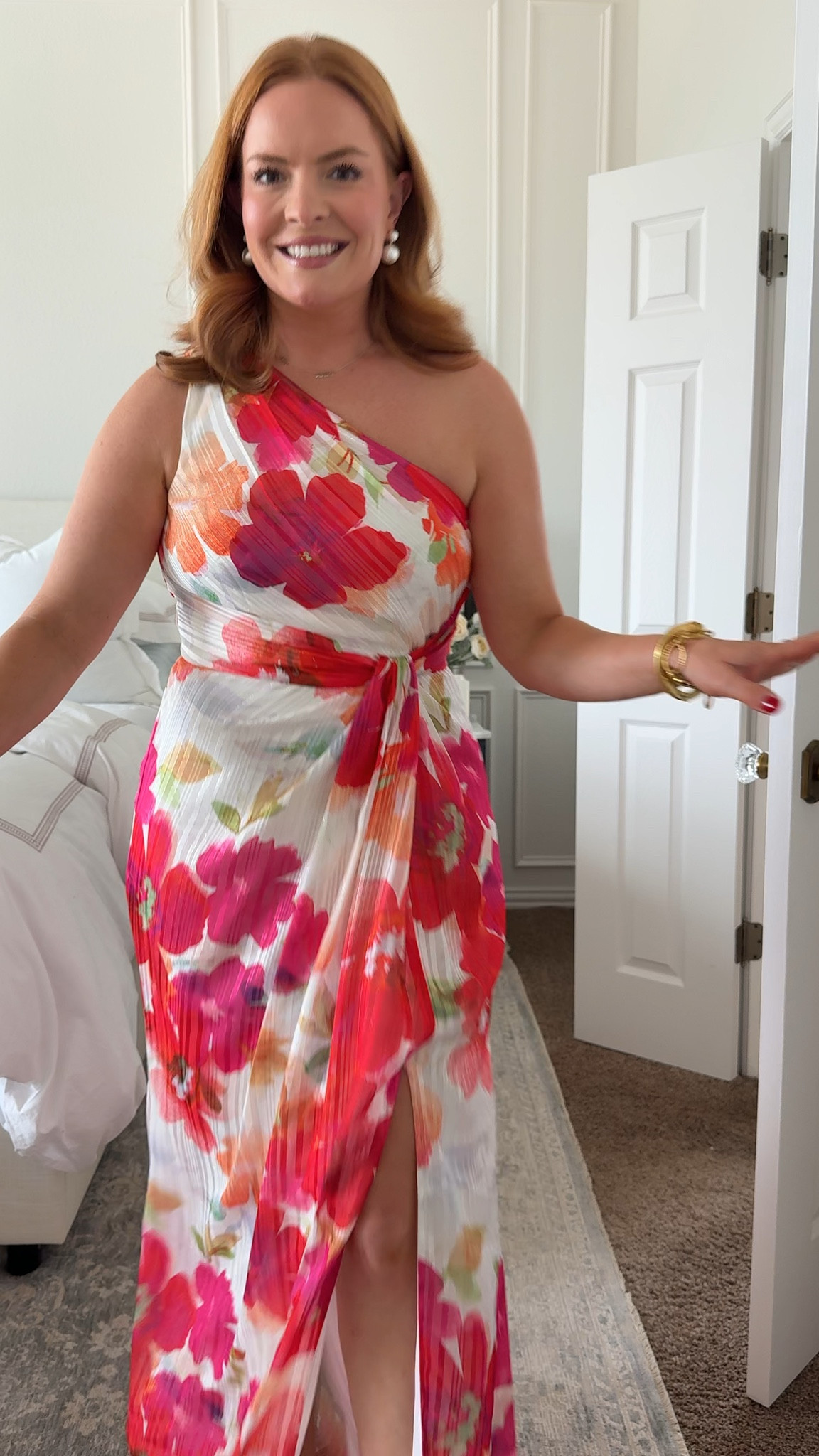 
This one-shoulder floral formal wedding guest dress is such a statement for spring weddings. The bold floral print and wrap-style silhouette make it perfect for formal venues, destination weddings, or evening celebrations.

If you’re searching for a colorful spring wedding guest dress that stands out but still feels elegant, this is a beautiful option.

Sizing: Wearing a size 8. True to size with a flattering wrap-style waist and flowy skirt. Comfortable for dancing and long events.

one shoulder wedding guest dress, floral formal gown, spring wedding guest outfit, colorful maxi dress for wedding

#LTKValentine #LTKmomlife #LTKWedding