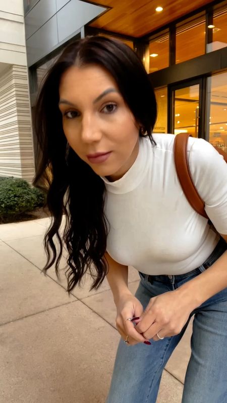 Effortless outfit idea styling the $15 bodysuit from Amazon with wide leg jeans and heels for a chic everyday look. 

#LTKfindsunder100 #LTKVideo #LTKstyletip