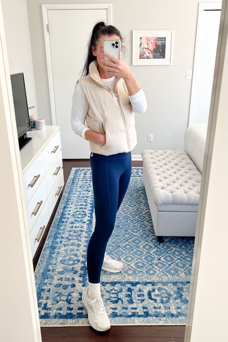 Casual activewear ootd - many items on sale!! I feel so hip in my new tan cropped puffer vest and white crew socks! Paired with a white long sleeve tee (incredibly soft & 40% off) and my favorite navy leggings (have pockets & excellent quality, 50% off). These are items I wear often and love! Completely the look with white sneakers. 

Sizing:
• White tee runs a little big, I’m wearing an XS and it is plenty roomy. For a more fitted look, I could size down to petite XS, but I like it a bit looser like this. 
• Leggings fit TTS. I’m wearing a petite S.
• Shoes fit TTS, but if Between sizes size up. 
*Vests I linked are similar

Casual outfit, activewear, mom style, sale alert, winter ootd, classic, neutral, trendy, Old Navy, Lands’ End 

#LTKfindsunder50 #LTKsalealert #LTKSeasonal