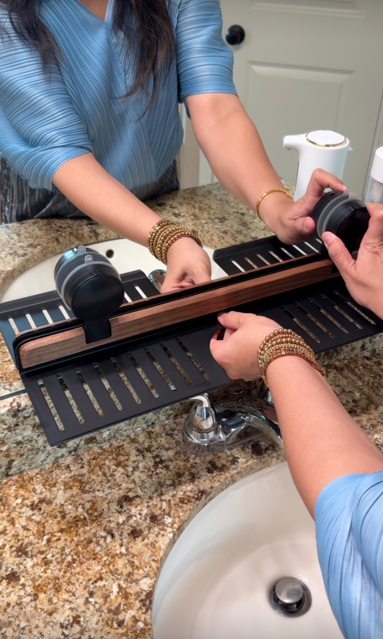 This over the faucet suction cup shelf fits perfectly over the sink for bathroom products  

#LTKHome #LTKmomlife #LTKBeauty