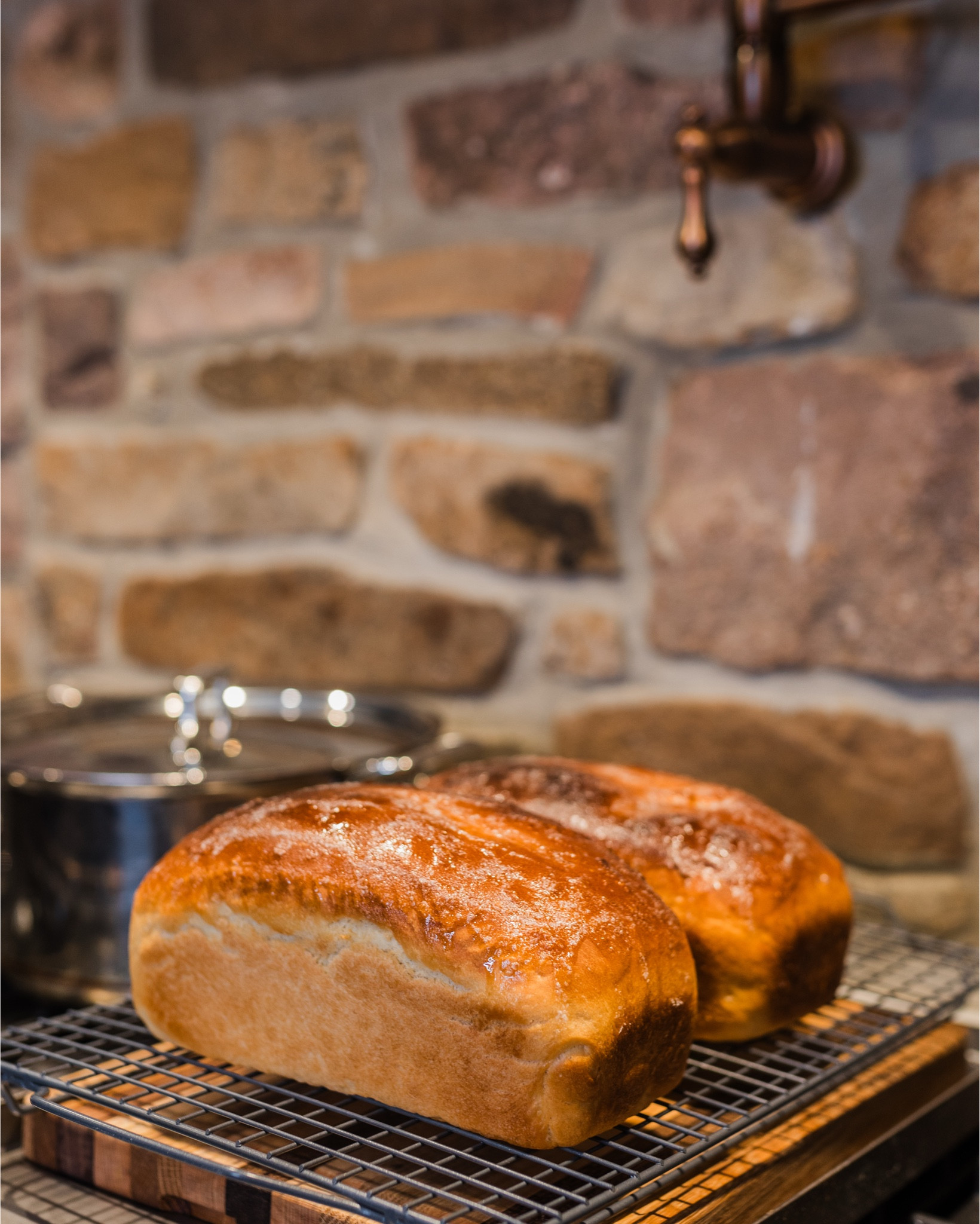 Baking bread on Sundays has been my (Lauren's) new therapy. It's been a lot of fun trying new recipes and knowing the bread I'm making for my family is so much healthier than store bought and it's so easy to make! I made two sandwich loafs (organic flour, yeast, water, honey & salt), sourdough bread, and sourdough bagels 🥯 (cinnamon sugar & everything seasoning). Our kitchen is one of my favorite room in the house. This space took 3 years to come together and it was worth all the effort and planning! 

#LTKHome #LTKU