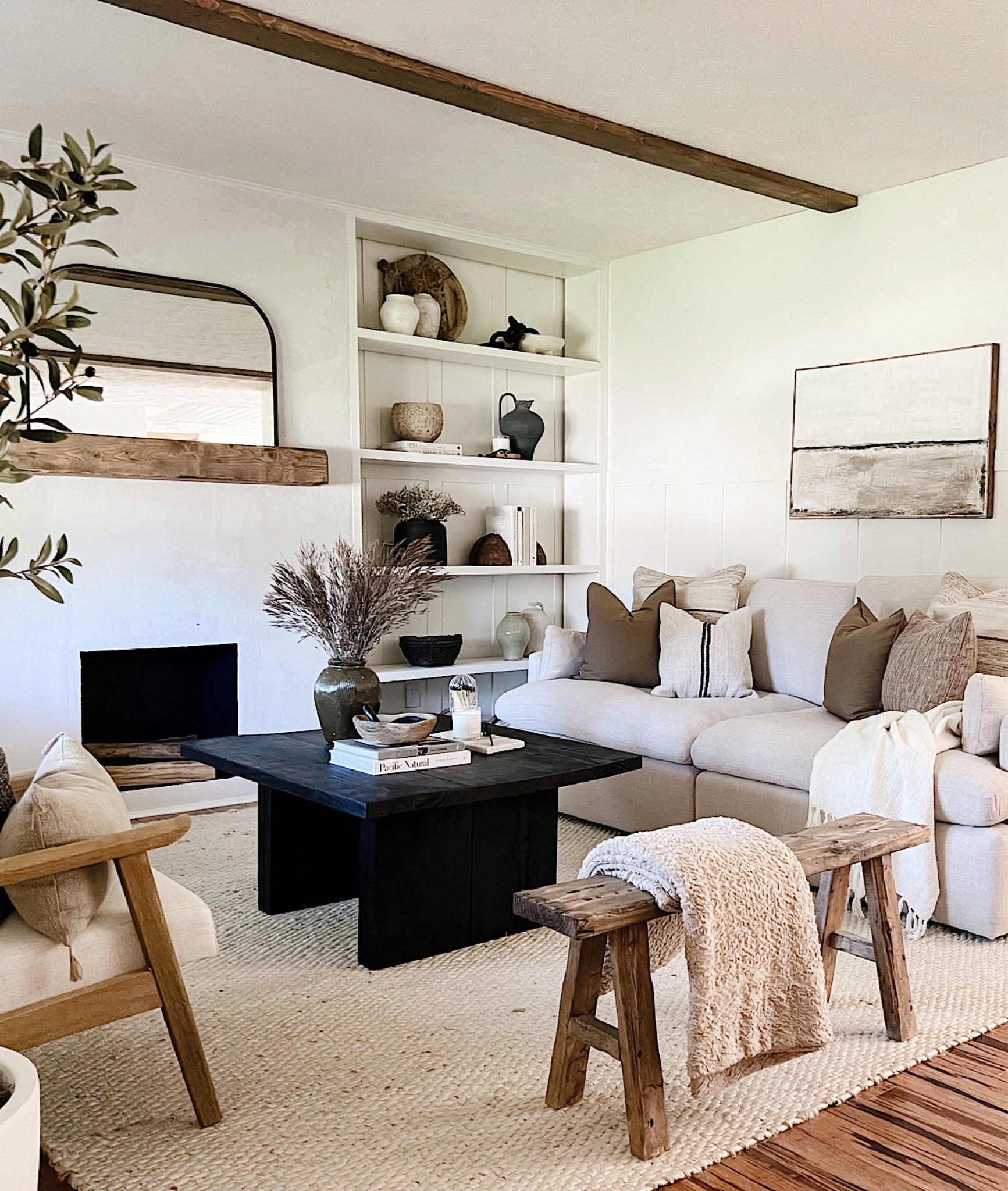 Living room decor. Neutral decor. Fall home decor. Organic modern decor. Coffee table. Wood bench. Linen sofa. Accent chairs. Jute rug. Coffee table decor. Mantel. Arch mirror  

#LTKhome #LTKSeasonal #LTKunder50