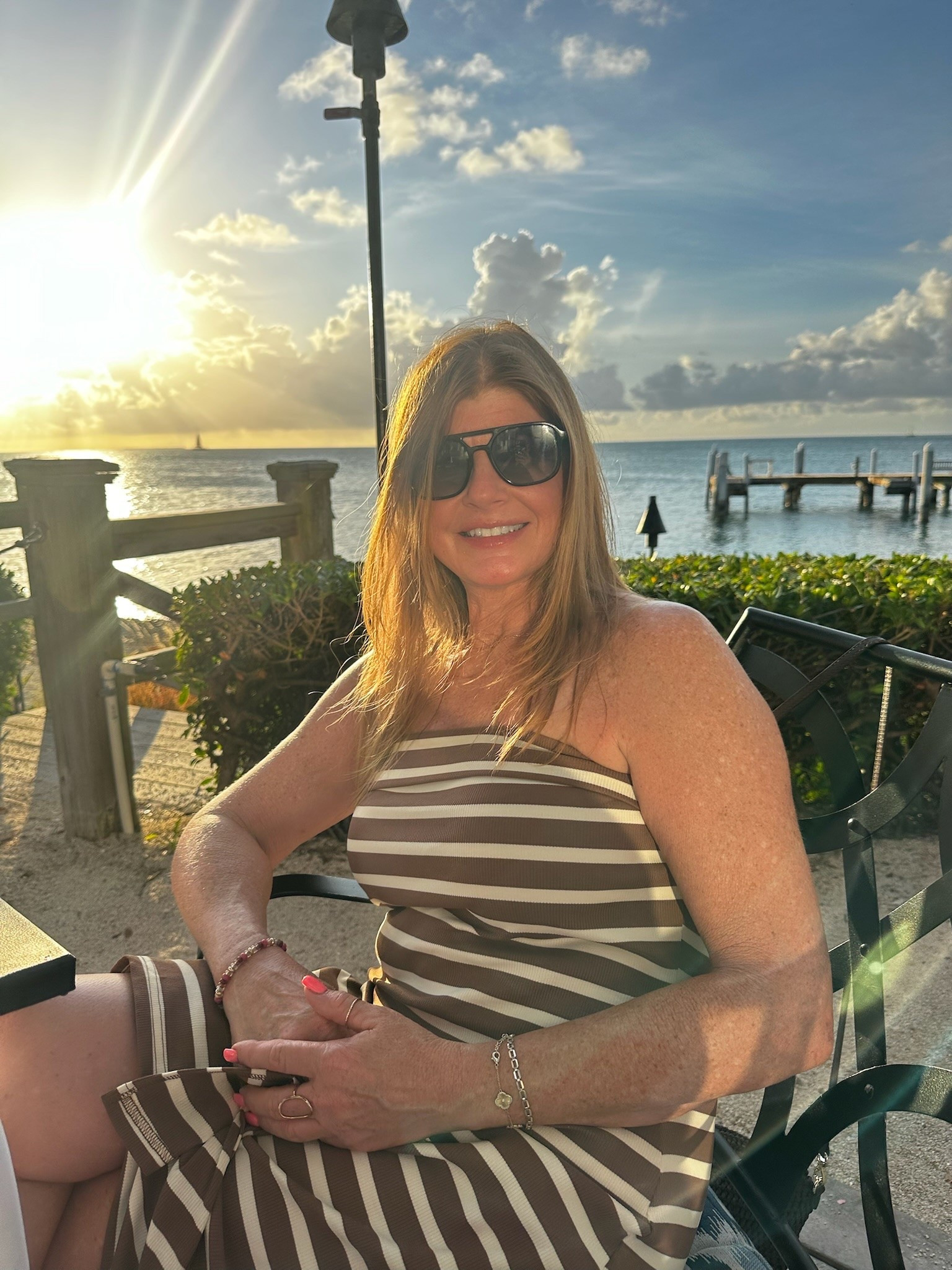 Perfect dress, perfect evening🤎☀️🌊
* Thick ribbed fabric to support you in all the right places, 24% off/ under $40 @amazonfindsandfashion 
* Sunglasses under  $15 @amazonfindsandfashion 
* The strapless top portion stays in place. 
* The perfect strapless bra. @nordstrom 
#summerdress #straplessdress #beachdress #momover50fashion #LTLOver50 #momover50

#LTKSaleAlert #LTKmomlife #LTKTravel