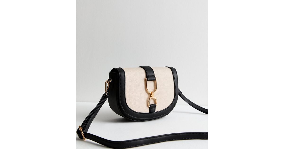 Black Canvas Cross Body Saddle Bag
						
						Add to Saved Items
						Remove from Saved Items | New Look (UK)