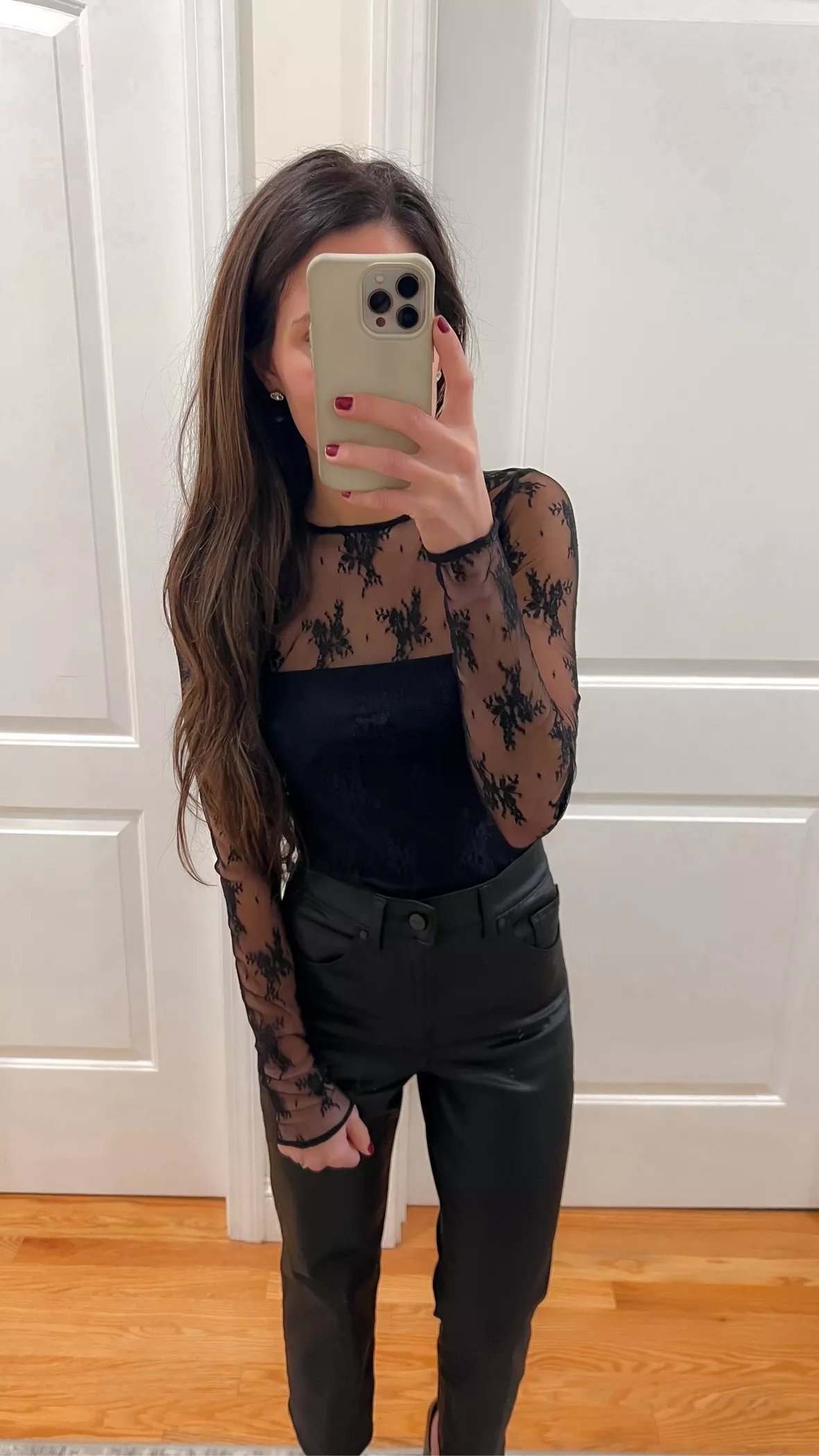 High waist jeans and a lace bodysuit.