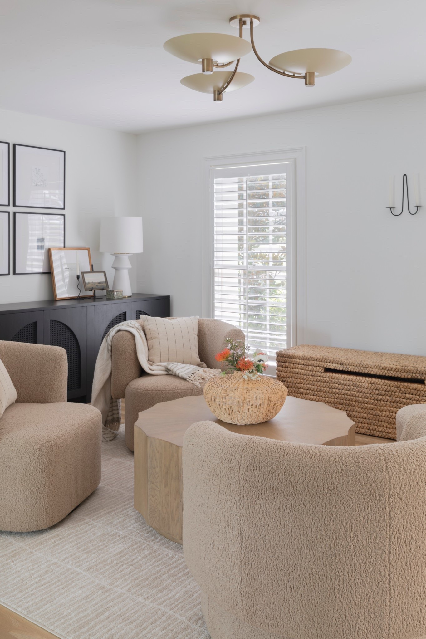 Sitting room, swivel chair, teddy chair, camel, cabinet doors

#LTKHome