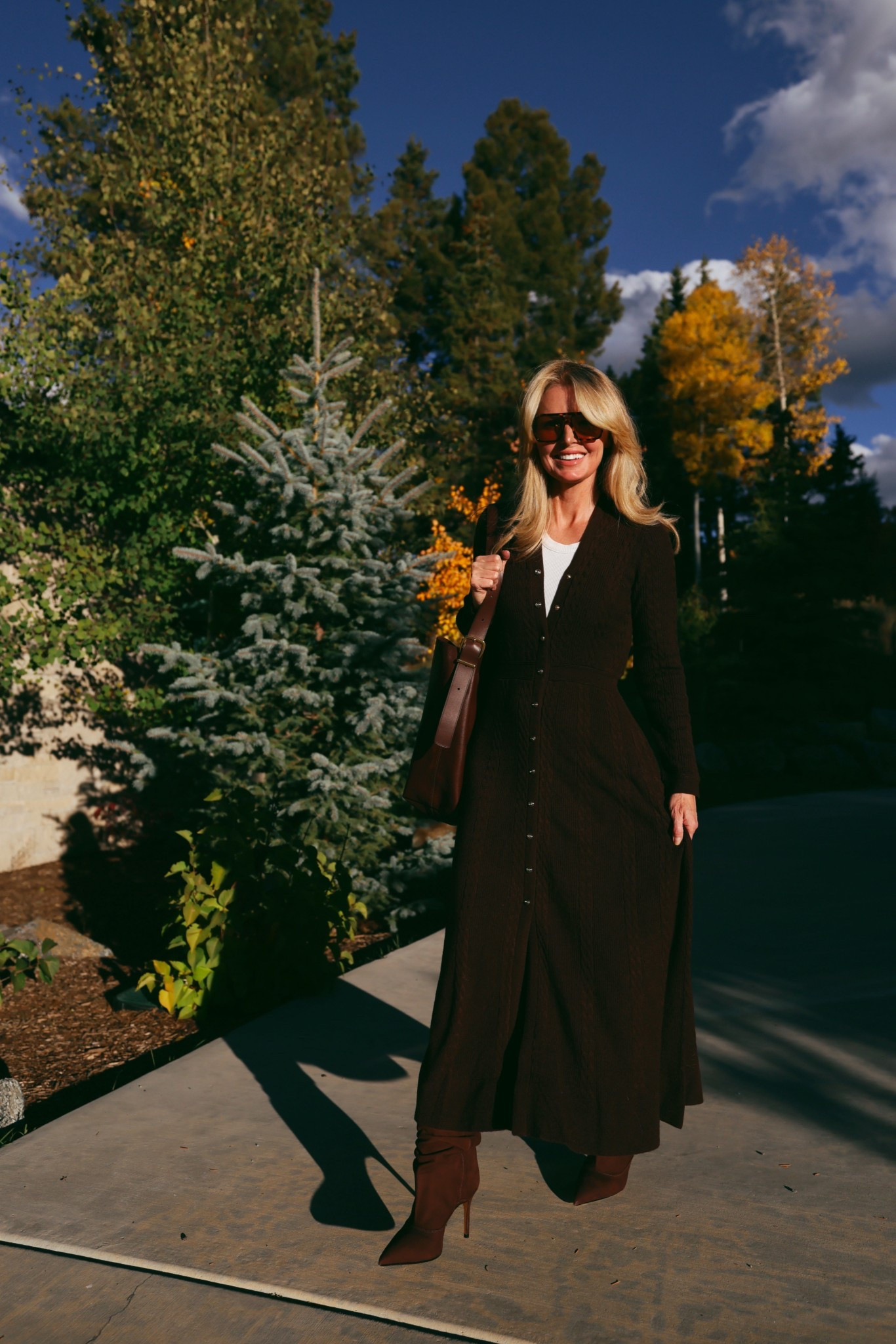 I recently picked up this sweater dress, and it instantly became one of my favorite fall finds. What really sets it apart is the softly flared skirt that gives the dress a feminine shape that flatters while gently skimming over the hips and thighs. Most knit dresses tend to cling in all the wrong places, but this one strikes the perfect balance: fitted where you want it, forgiving where you need it. The beautiful metallic buttons that trail down the front also create a subtle, slimming effect. It’s lightweight enough that you won’t overheat, making it an ideal option for transitional weather. TTS. 

Pair it with mid-calf booties (like I did here), sleek mules, or knee-high boots for an elegant yet effortless look that works everywhere—from the office to dinner.

~Erin xo 

#LTKSeasonal #LTKStyleTip