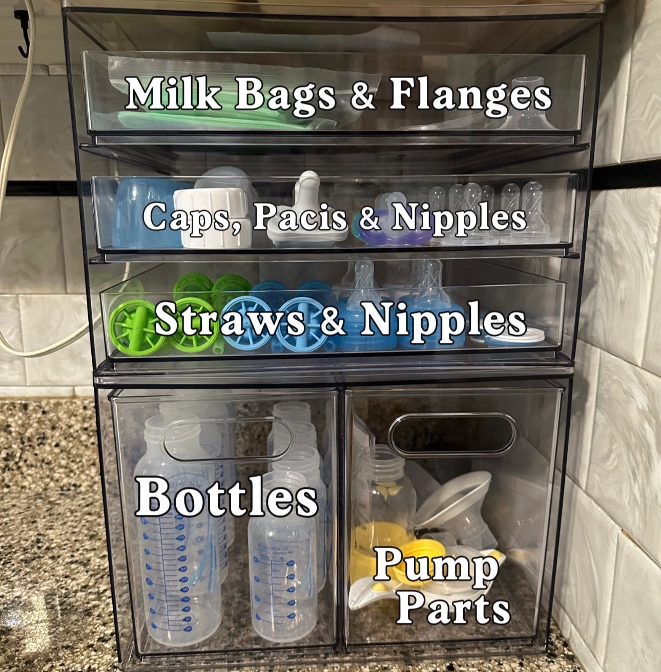 I have used the Dr Brown bottles with 2/3 of my kids.  We love the bottles until it comes time to wash them.  I HATE ALL THE PARTS.  BUT…. I was scrolling on TikTok and saw this organizing system and had to try it.  IT WAS LIFE CHANGING.  With my first I had a dish rack just for bottle parts that I used to store and sort the parts but this is NEXT LEVEL!!  I got my pieces on sale so it only cost me $20!!