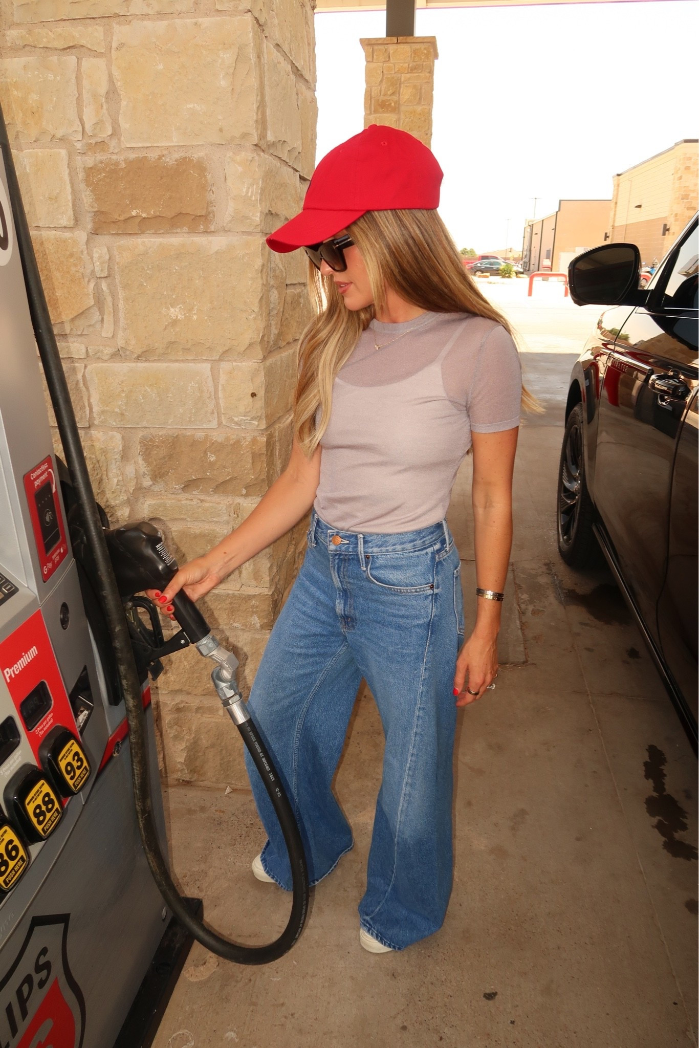 Daytime look - i love these jeans, they come in petite length. I’m actually wearing the regular length with a platform sneaker here, I have super long legs for being 5’2. I could have done the petite length though and wore flats. Xs in tee, small in cami. Sneakers true to size