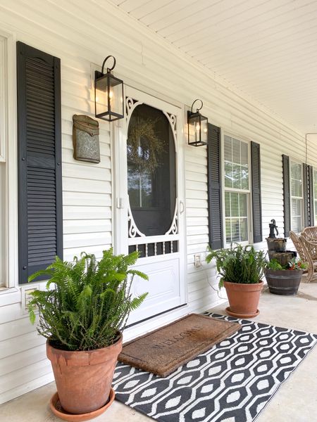 Budget outdoor lantern sconces under $50 from Home Depot.  Terracotta large pots, screen door, black craftsman style door from Lowe’s 
Resin rug, 36” welcome mat, outdoor fountain
Amazon 


#LTKsalealert #LTKunder50 #LTKhome