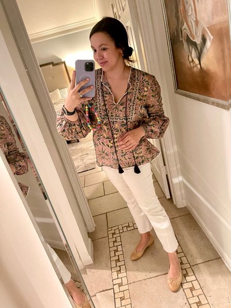Oliphant design printed top and kick flare white denim with raw hem. Top runs tts 
Chanel ballerina flats 
Spring and summer outfits, travel style, mom outfit idea 
Wear to work style 


#LTKworkwear #LTKstyletip